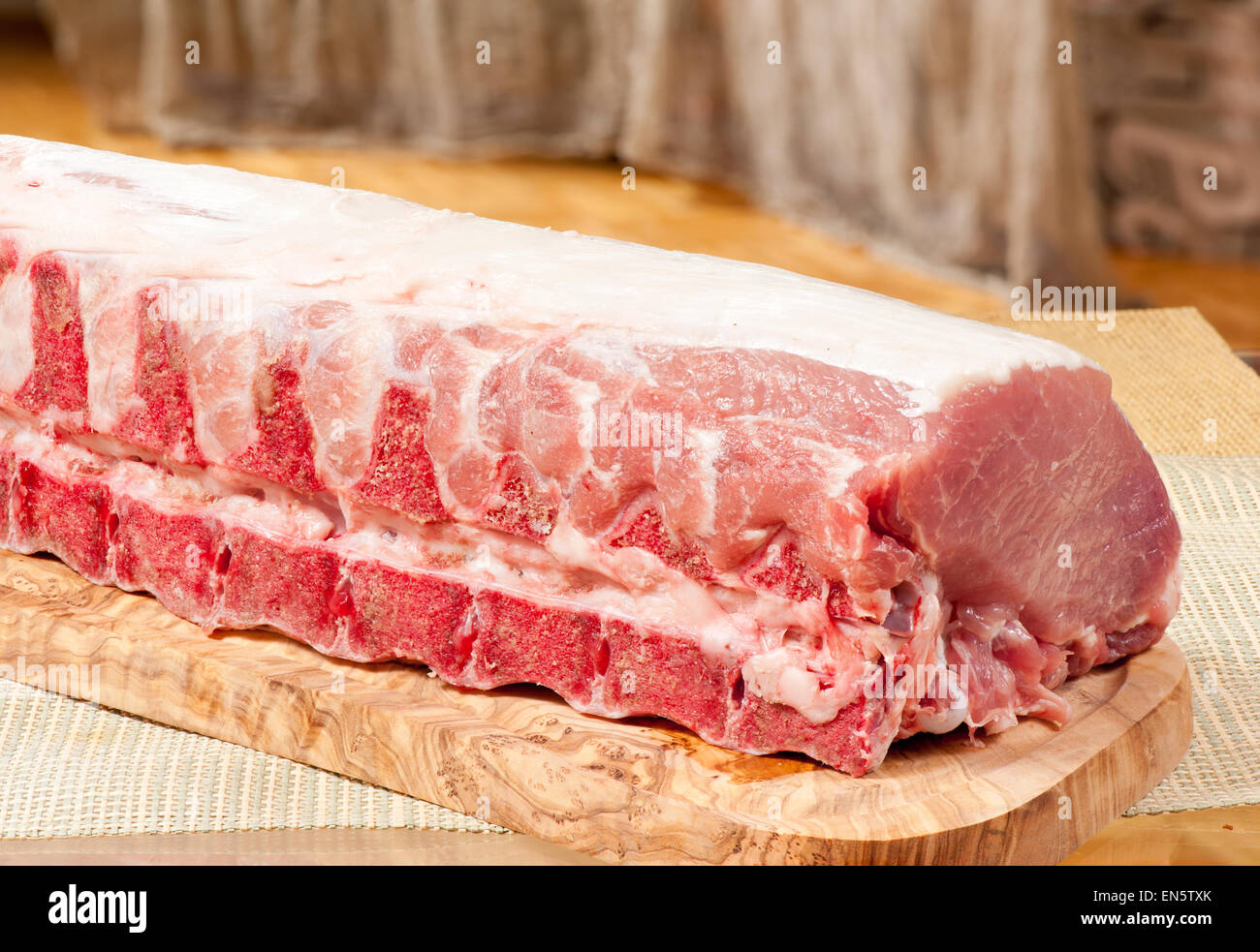 Raw bone pork chop portion lying Stock Photo