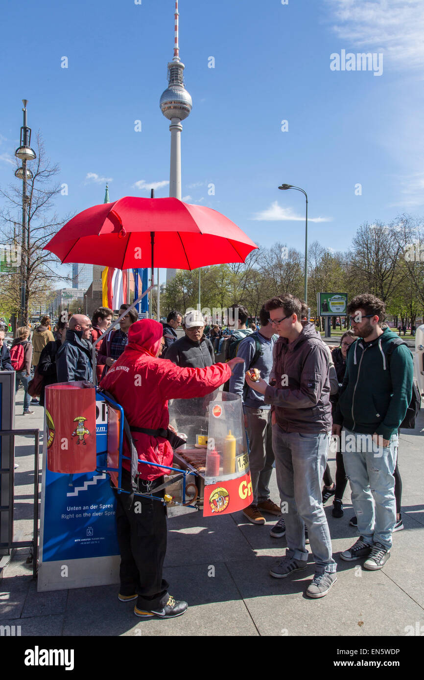 Mobile fast food stand, German Bratwurst, German sausages fresh from a grill, BBQ, barbecue, tourists, Stock Photo