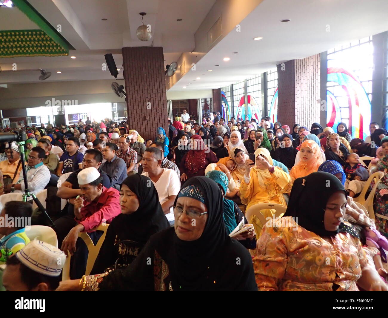 Quezon City, Philippines. 28th Apr, 2015. Hundreds of Muslims around the Philippines gathered at UP Bahay ng Alumni in Quezon City for the 41st Qur'an Reading Competition (QRC) with this year's theme, ''Trabaho ko, 'Ibadah' Ko' which means 'my job is a form of worship to the Almighty Allah Subhanahu Wa Ta'ala.' QRC was institutionalized in 1976 and serves as vehicle in enhancing the country's international image and in the enrichment of the Philippines' diplomatic relations with different Islamic countries. Credit:  Sherbien Dacalanio/Pacific Press/Alamy Live News Stock Photo