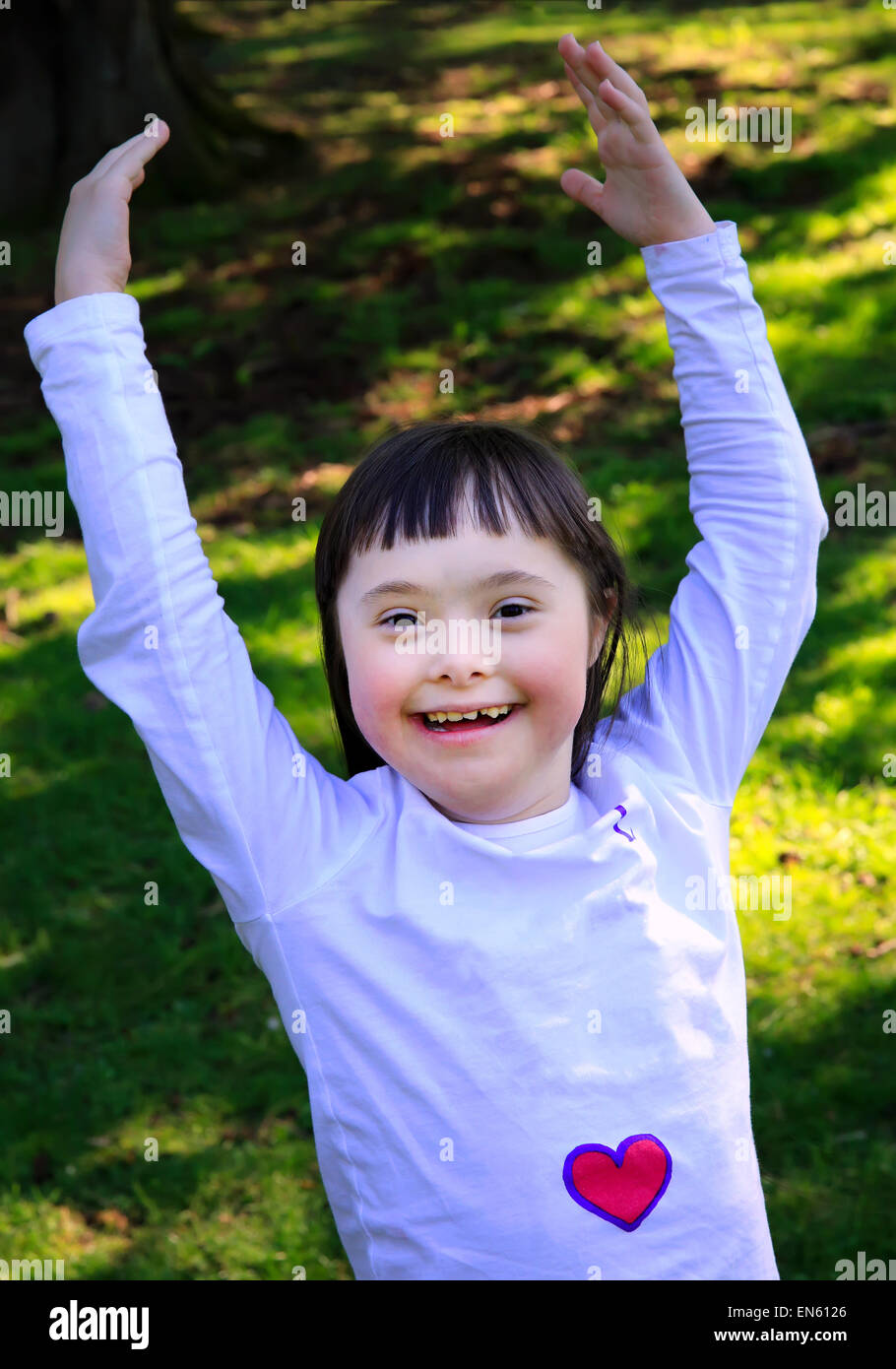 Portrait of beautiful young girl in the park Stock Photo - Alamy