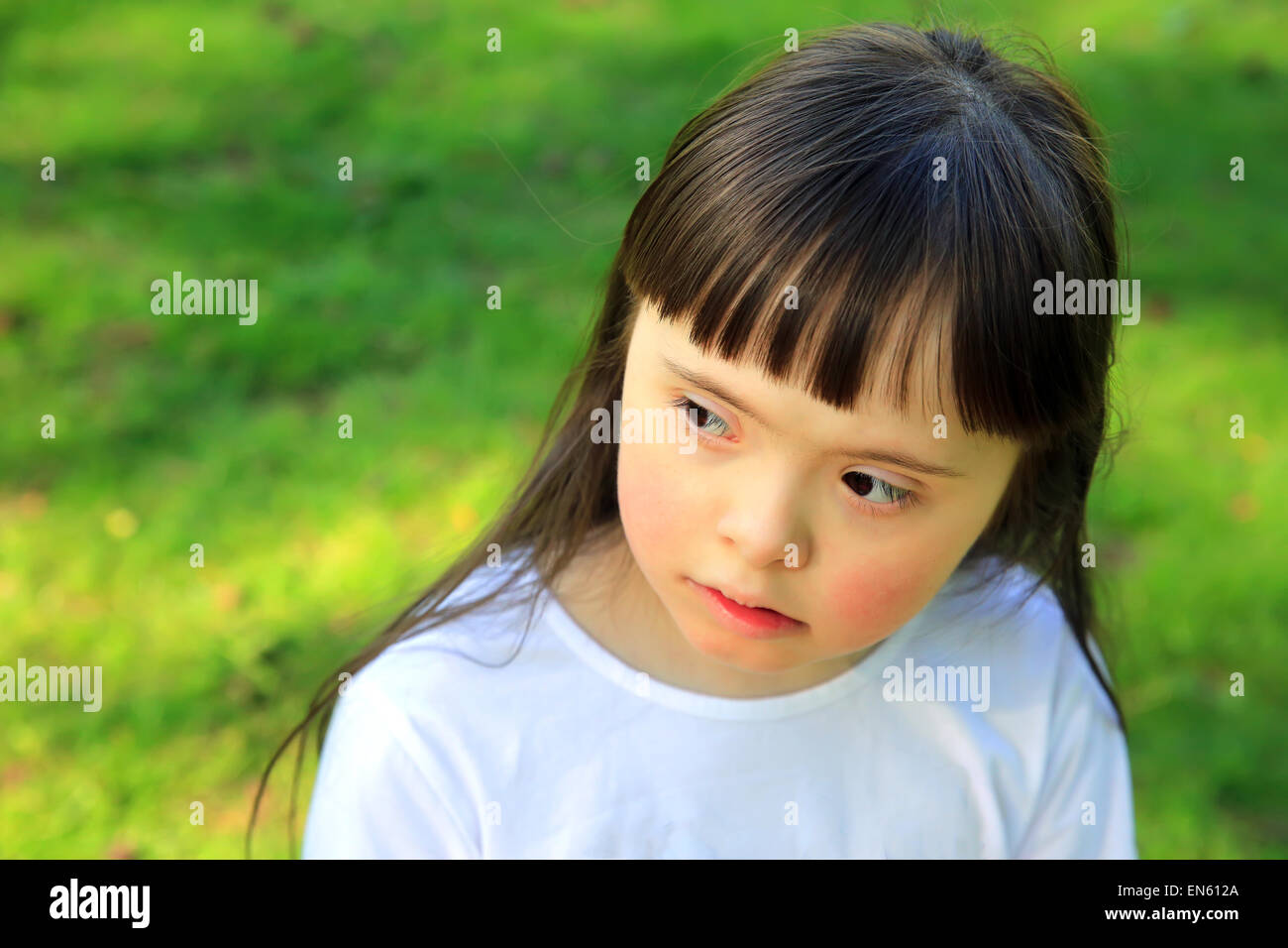 Portrait of beautiful young girl in the park Stock Photo - Alamy
