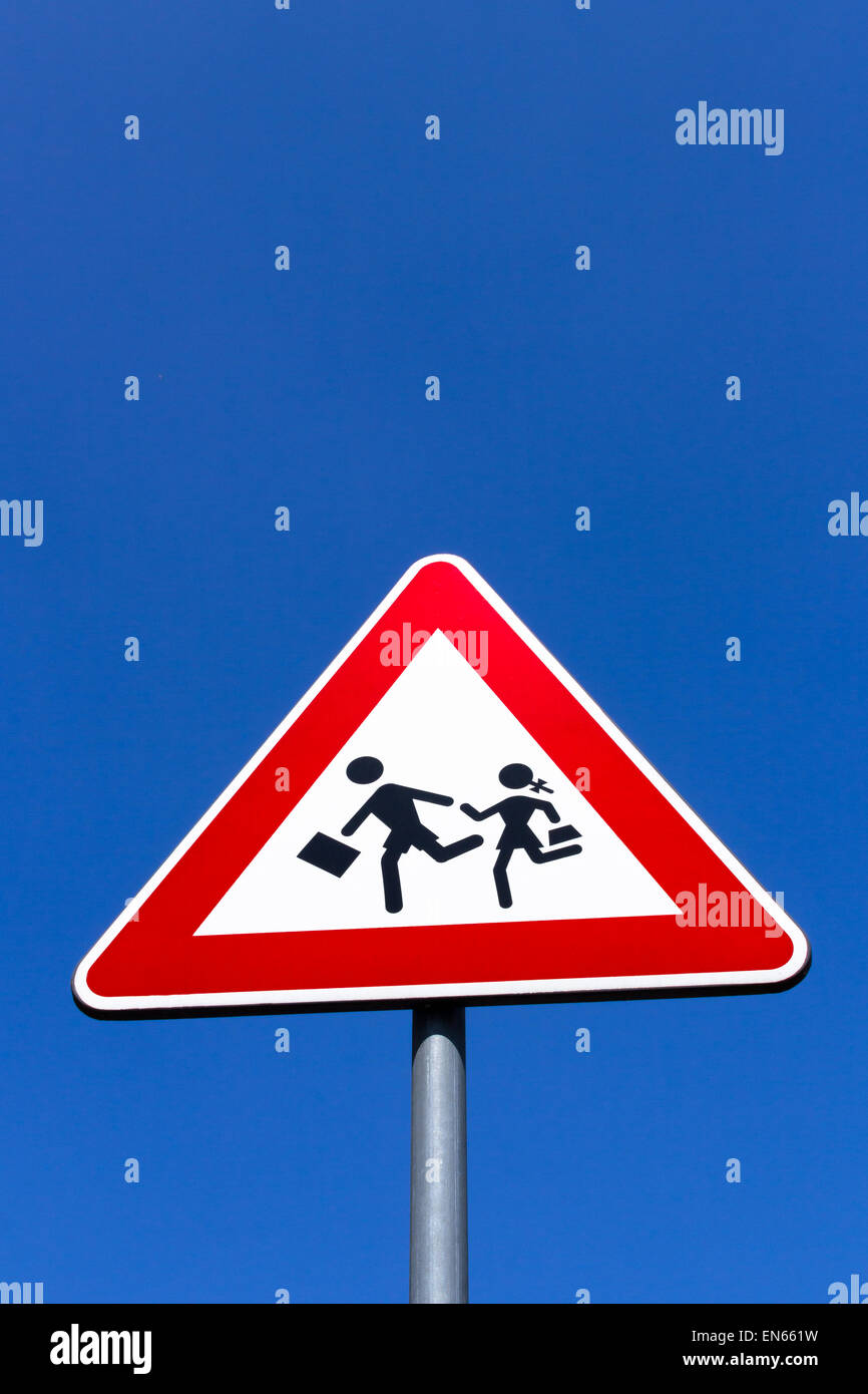 Road Sign of crosswalk of students, in vertical composition. Stock Photo