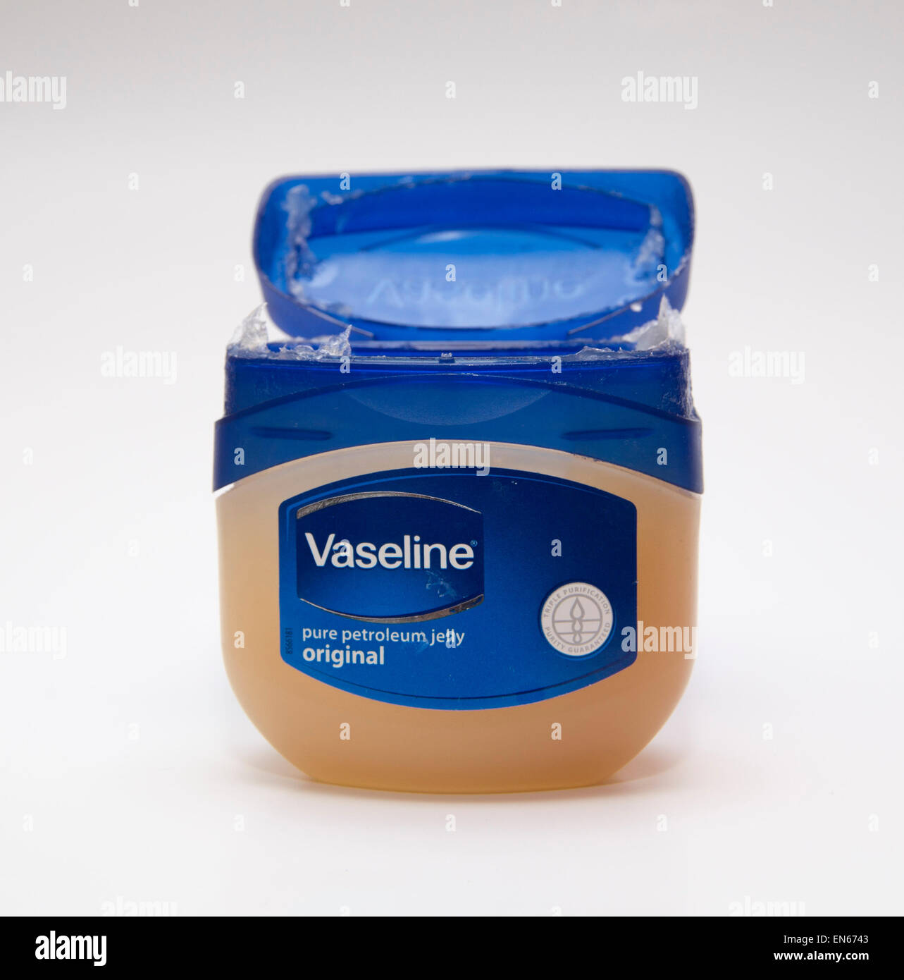 Tub of Vaseline petroleum jelly, isolated on white background. Stock Photo