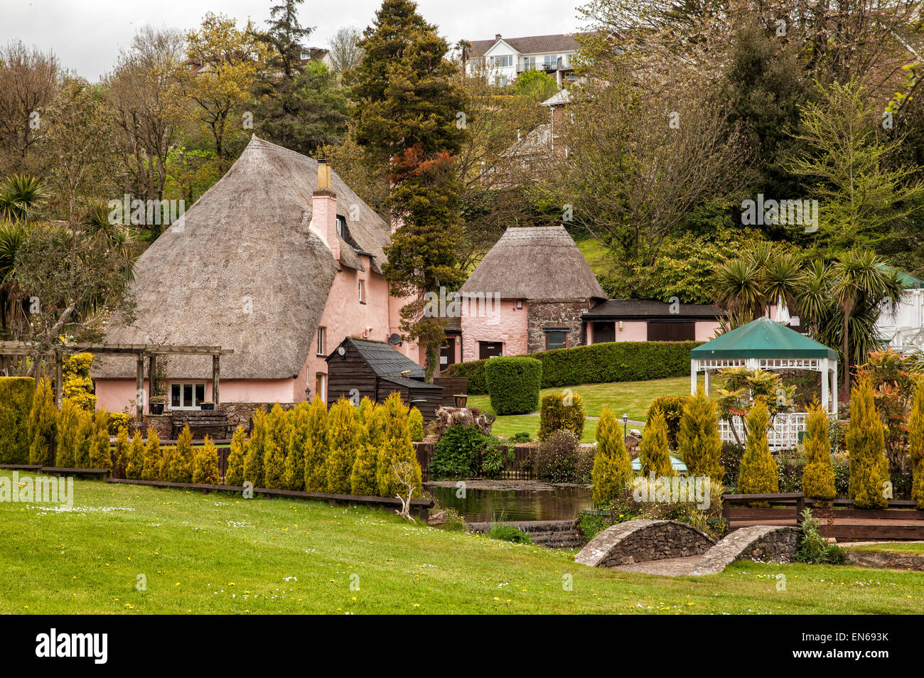 The garden of Rose Cottage a chaming thatched cottage in Cockington in