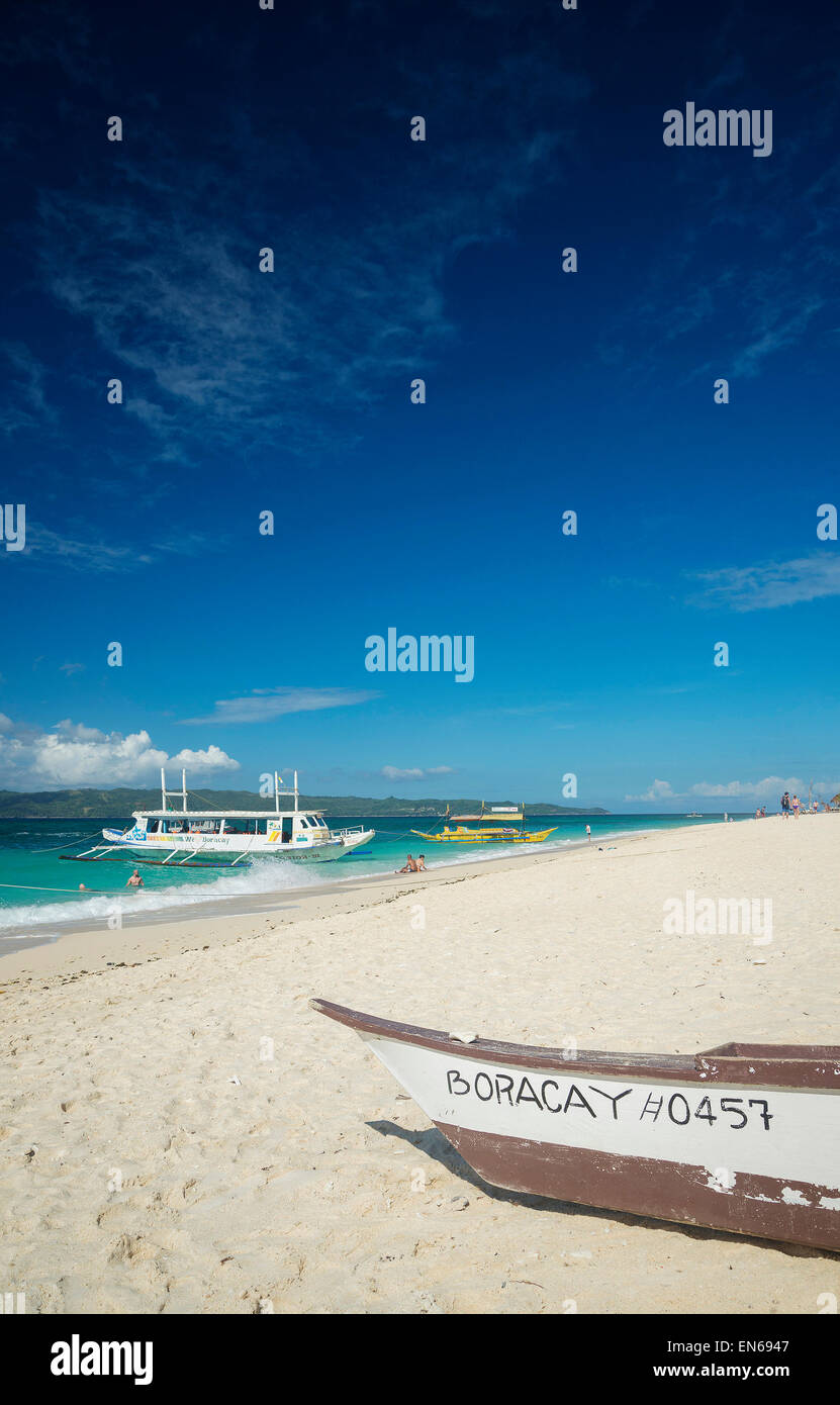 puka tropical paradise beach with boats in boracay philippines Stock Photo