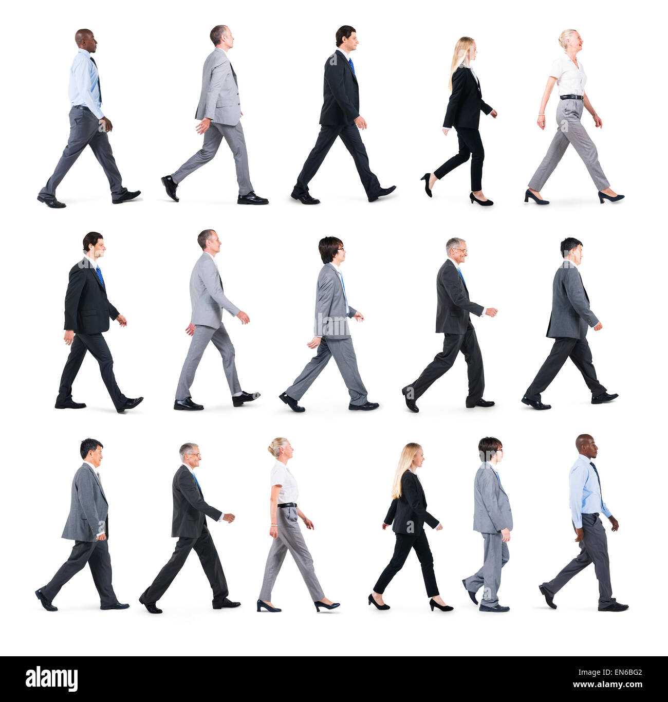 Group of Business People Walking in One Direction Stock Photo