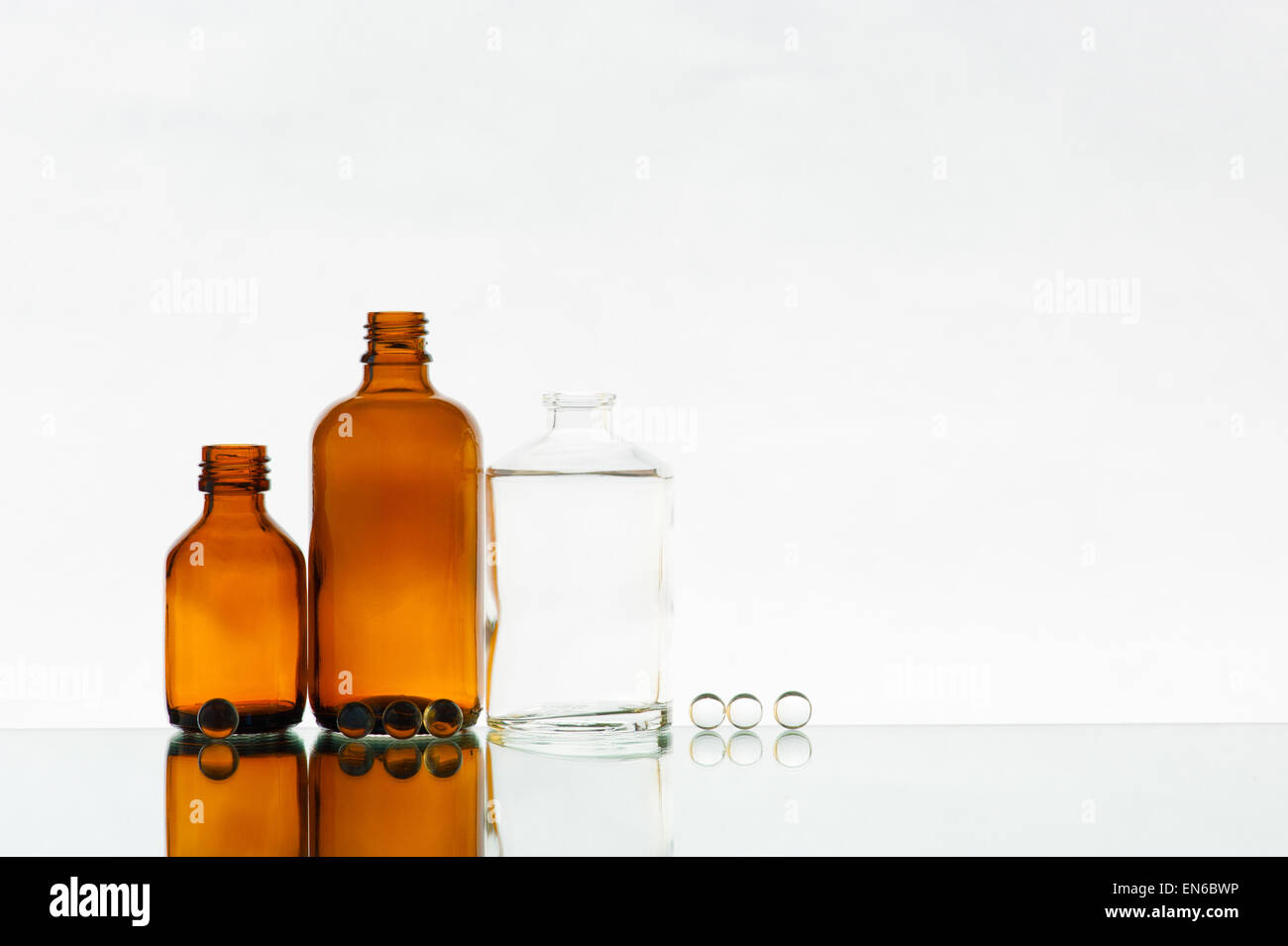 Empty various medicine bottles on the light background Stock Photo