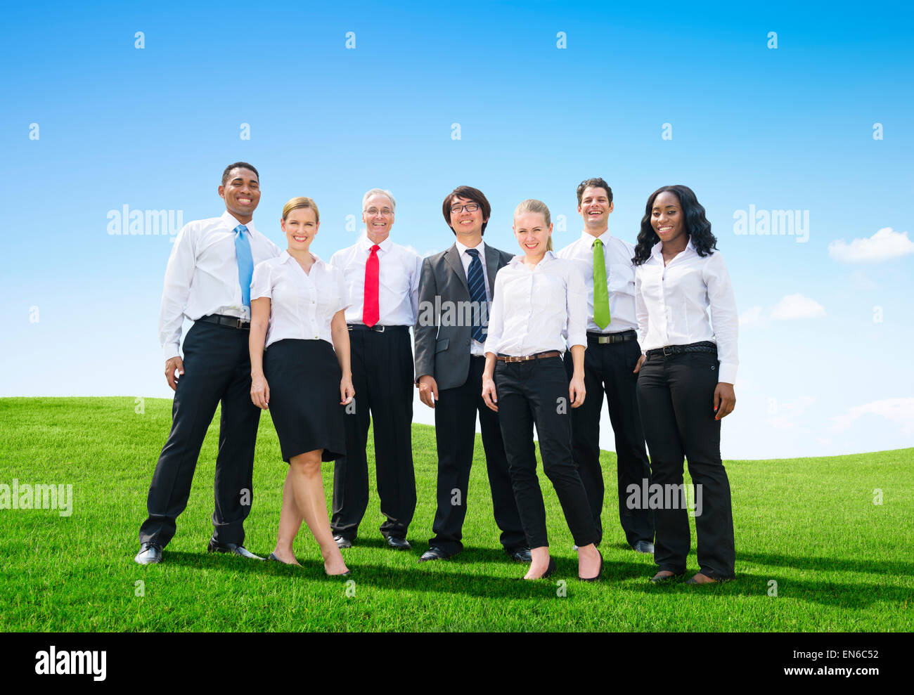 Business people posing outdoors hi-res stock photography and images - Alamy