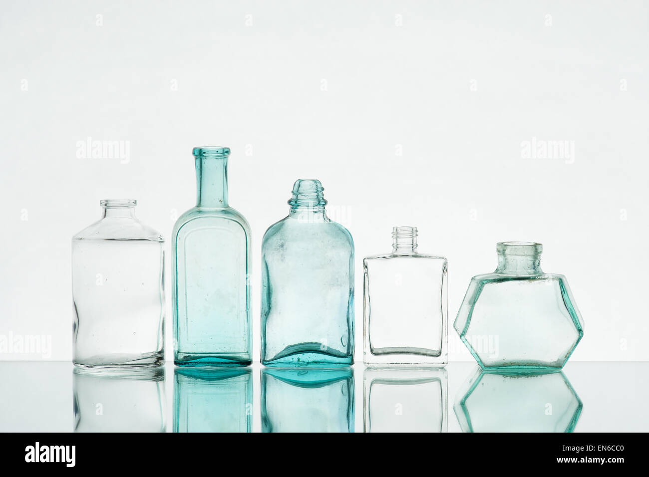 Composition of various vintage bottles on the light background Stock Photo
