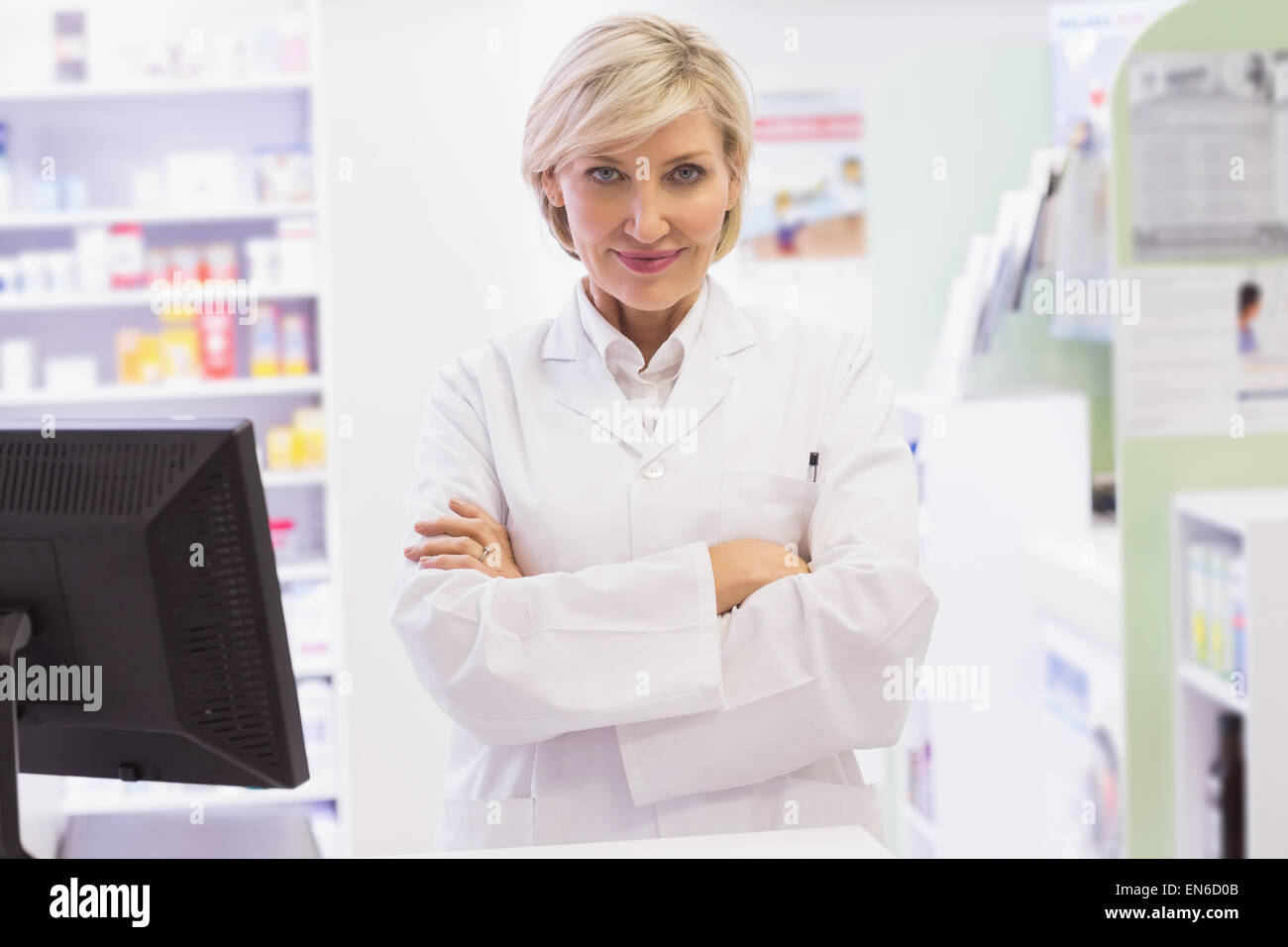 Smiling mature woman pharmacist in hi-res stock photography and images ...