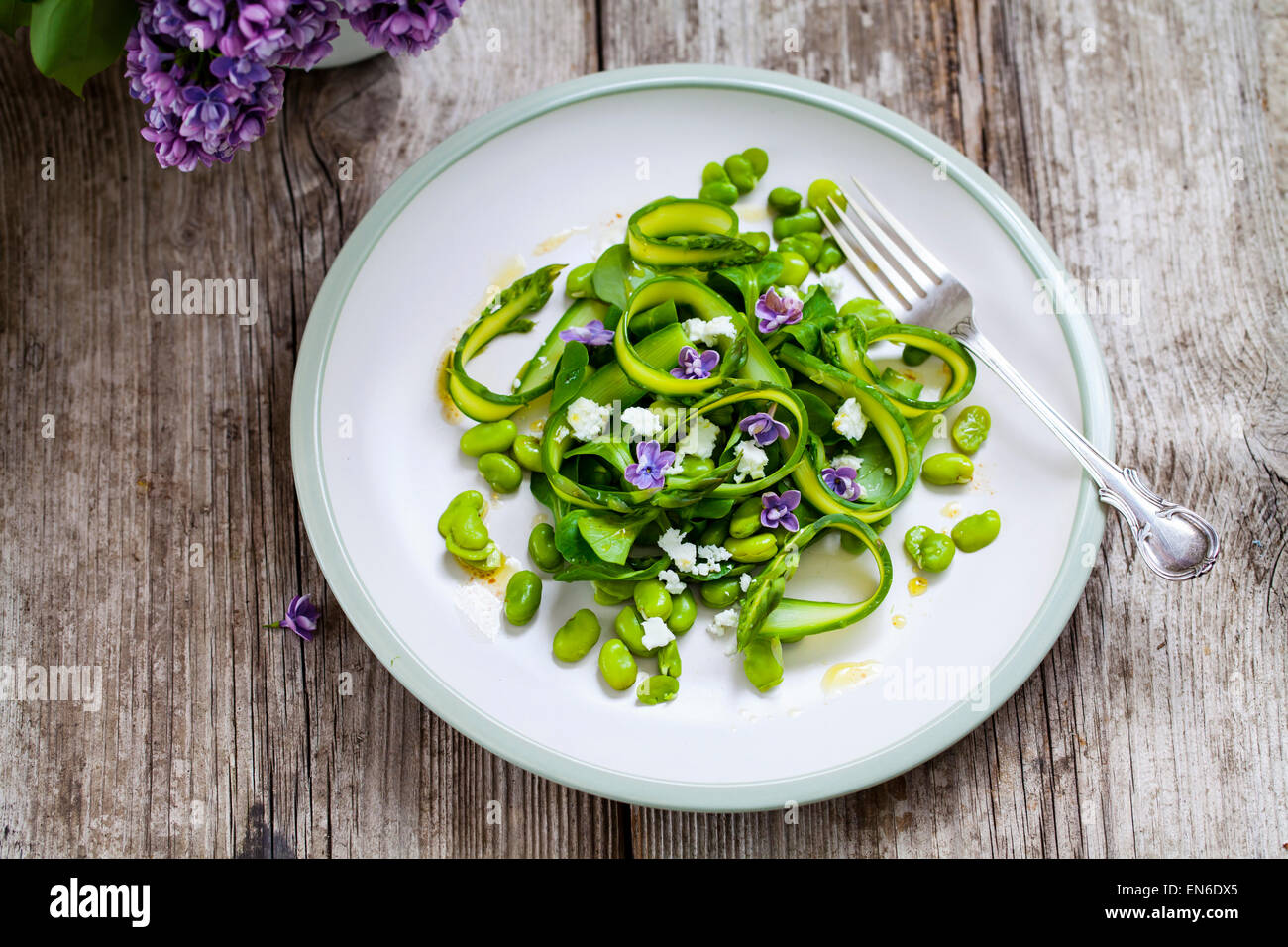 Asparagus, broad beans and lilac salad Stock Photo Alamy