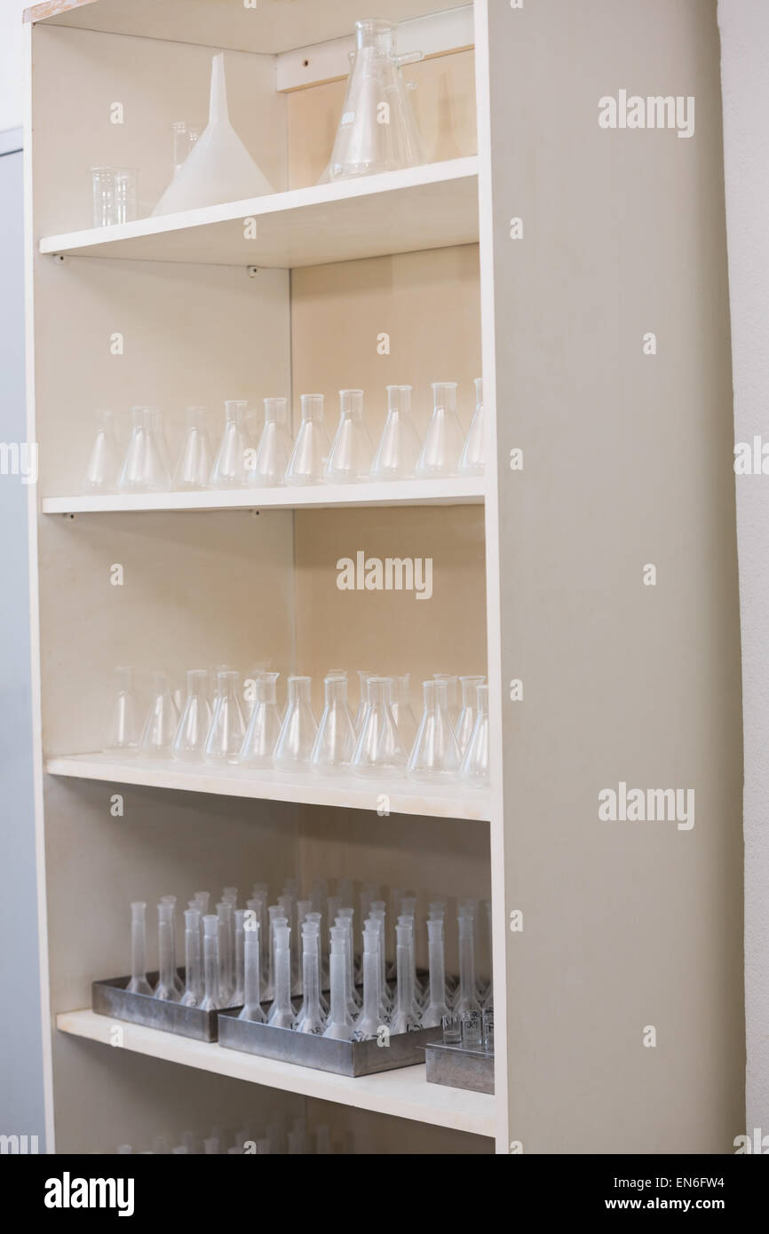 Storage unit with test tubes and beakers Stock Photo