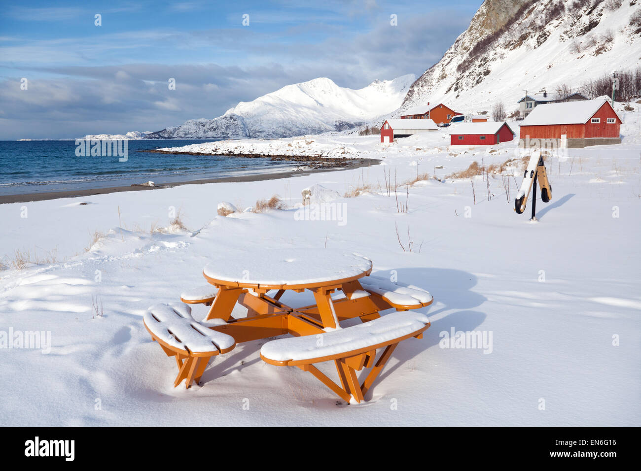 Snowy village by the sea in Tromso region, Norway Stock Photo