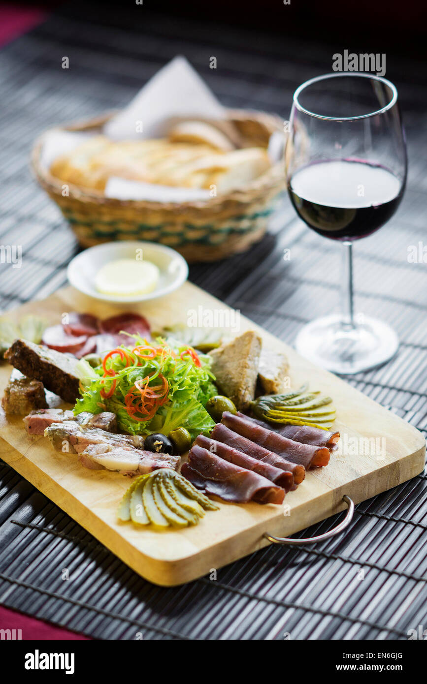 mixed traditional french cured meats and pate starters platter Stock Photo