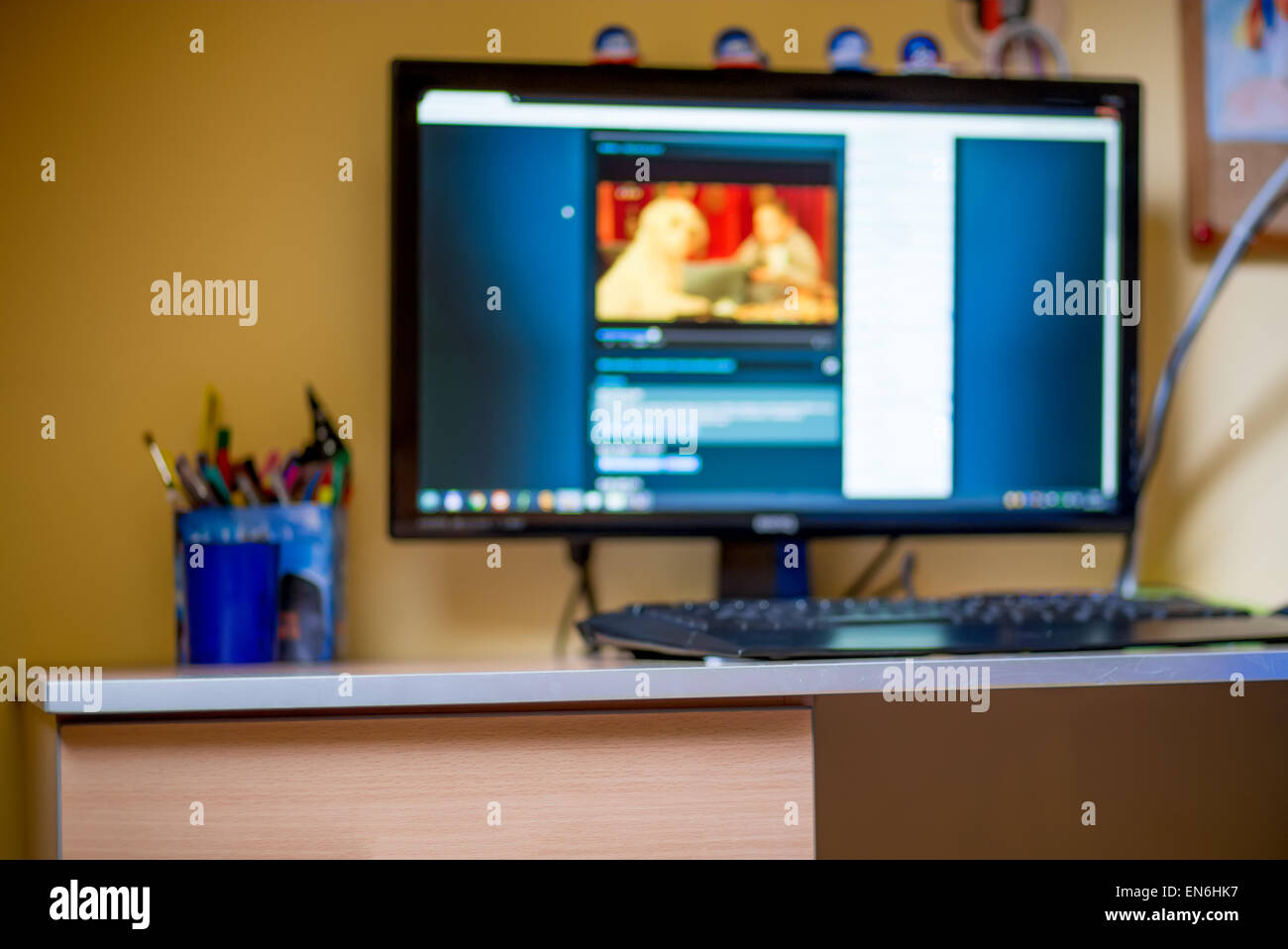 Close-up of professional gaming setup laying on desktop in neon