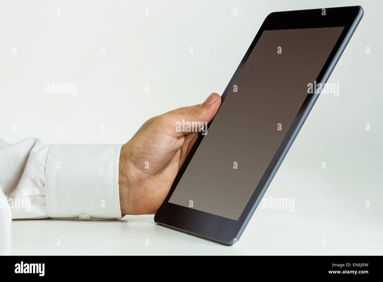 Man using a tablet pc Stock Photo - Alamy