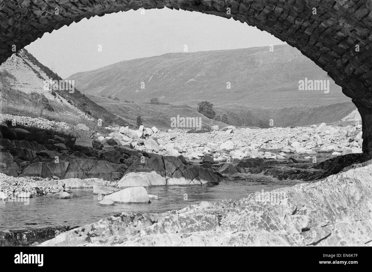 A view underneath a stone bridge at Glen Roy in Invernesshire in the Highlands of Scotland. Circa 1960. Stock Photo