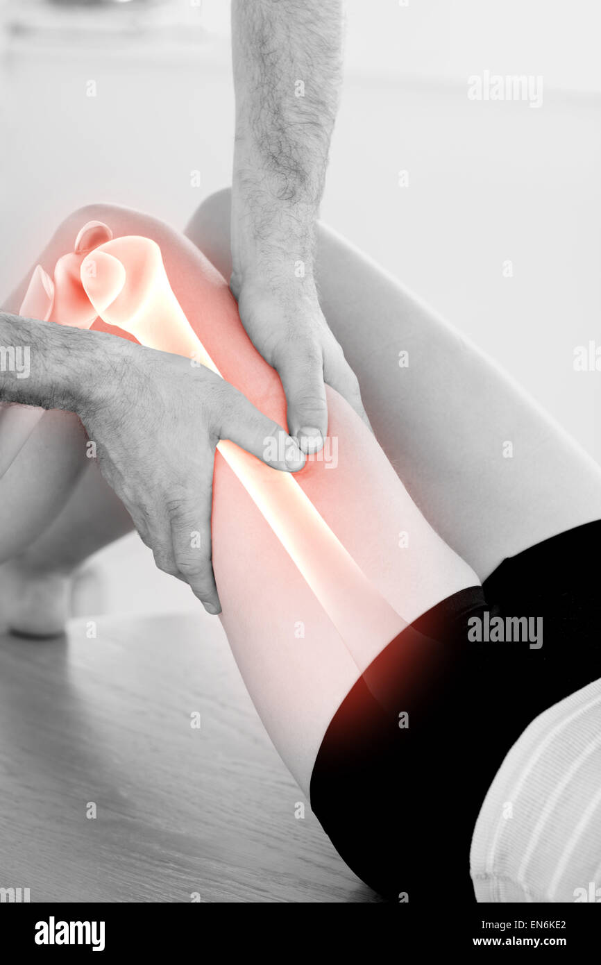Highlighted bones of woman at physiotherapist Stock Photo