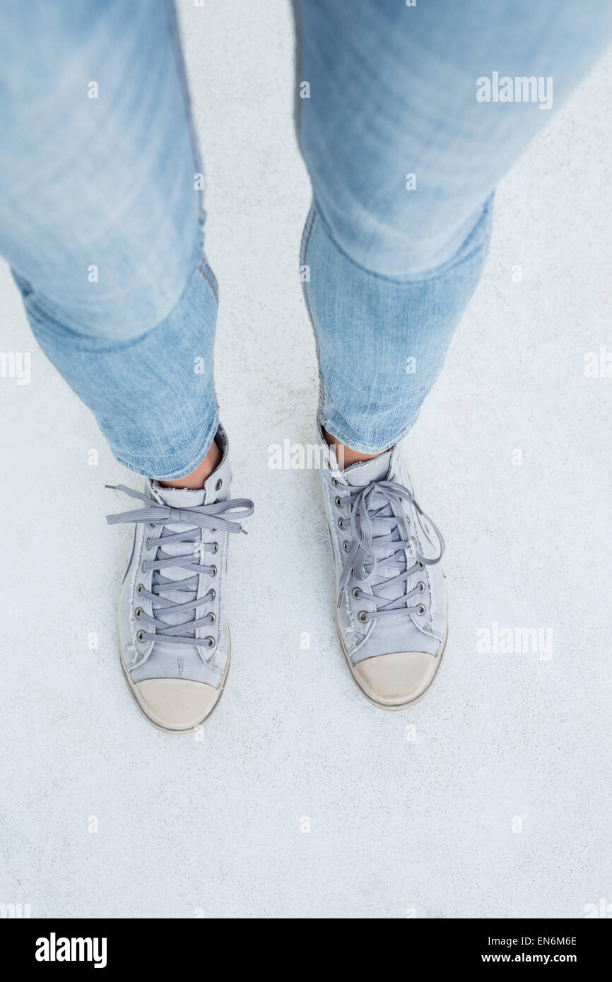 Woman wearing trainers Stock Photo - Alamy