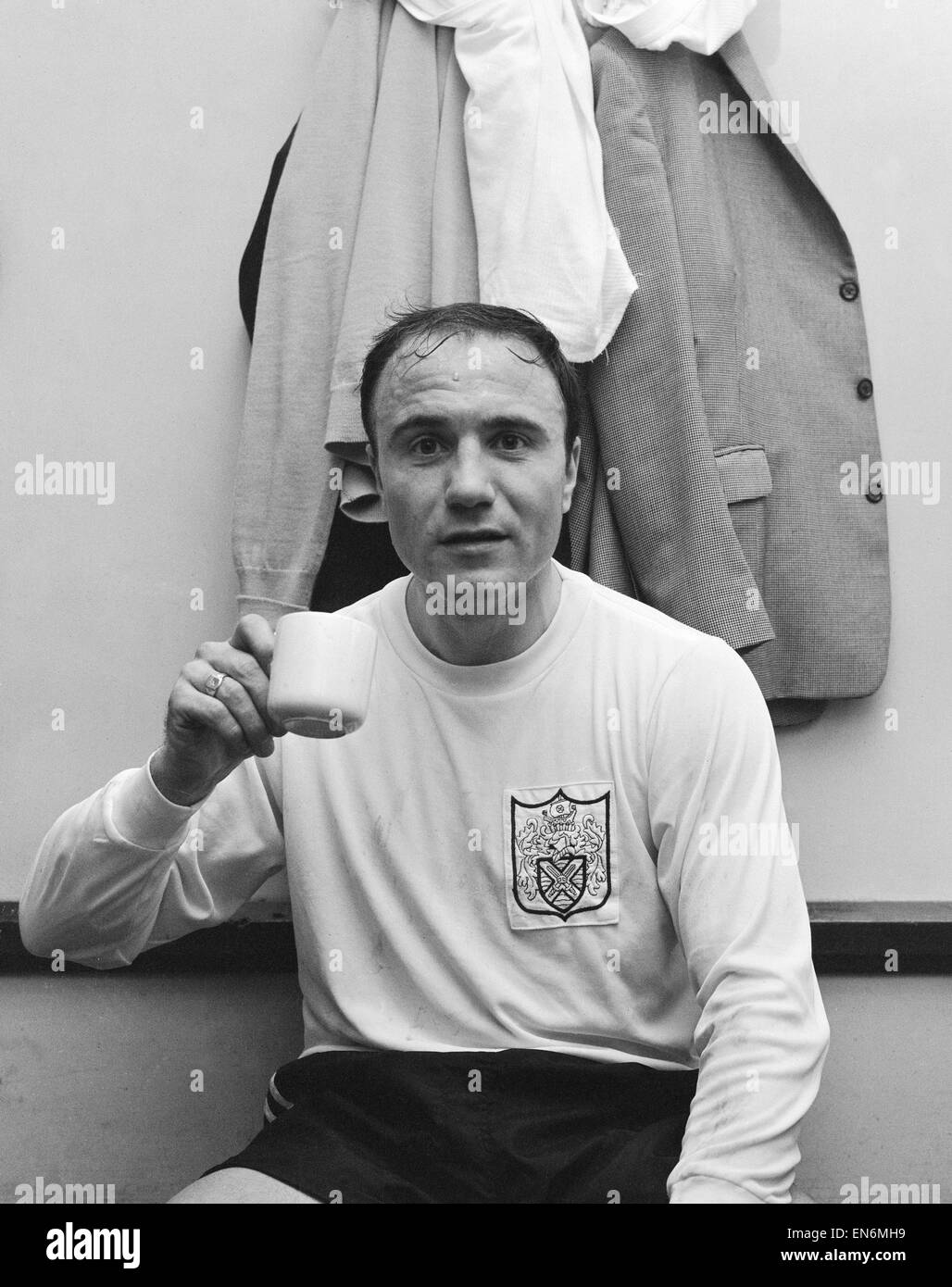Fulham Reserves v. Metropolitan Police at Imber Court. George Cohen having a cup of tea after playing for the reserves. 25th November 1968. Stock Photo