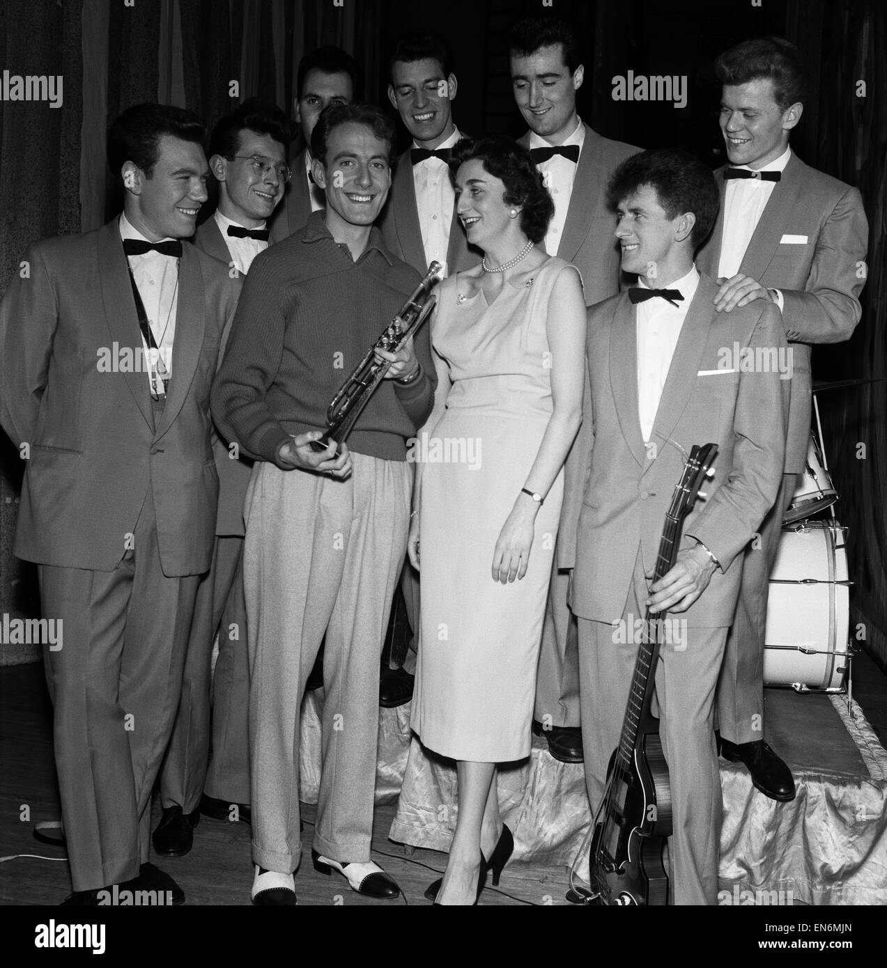 Band Leader John Barry 23 with members of his band & their new champeron Amy Rosser 25, 19th October 1957. Stock Photo