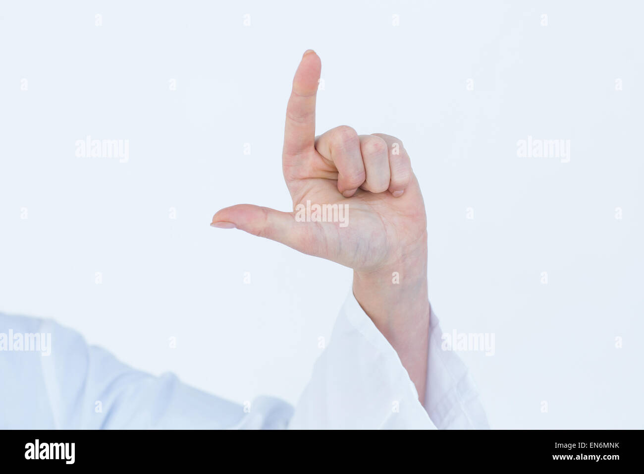 Doctor pointing up with finger Stock Photo