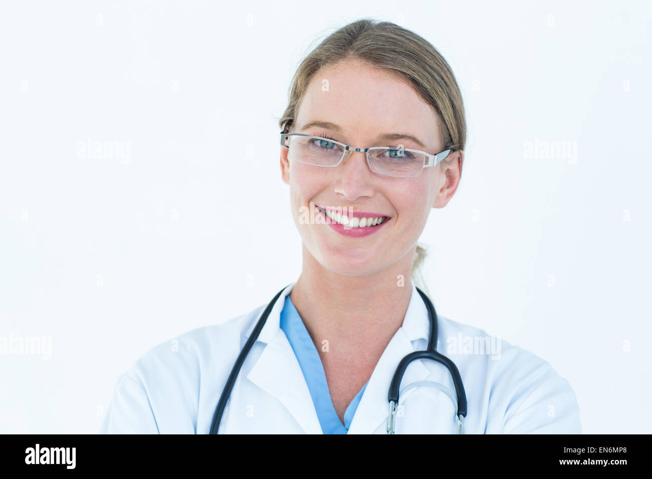 Smiling doctor looking at camera Stock Photo - Alamy