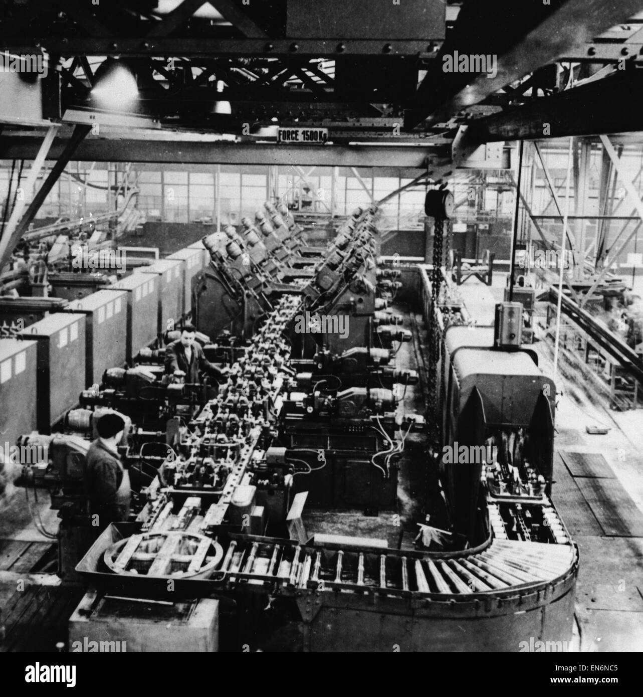 Picture to accompany the "Robot Revolution" feature which ran in the Daily Mirror newspaper on the week commencing 27th June 1955. Electronic and conveyor belt devices in operation at a British factory. 20th June 1955. Stock Photo