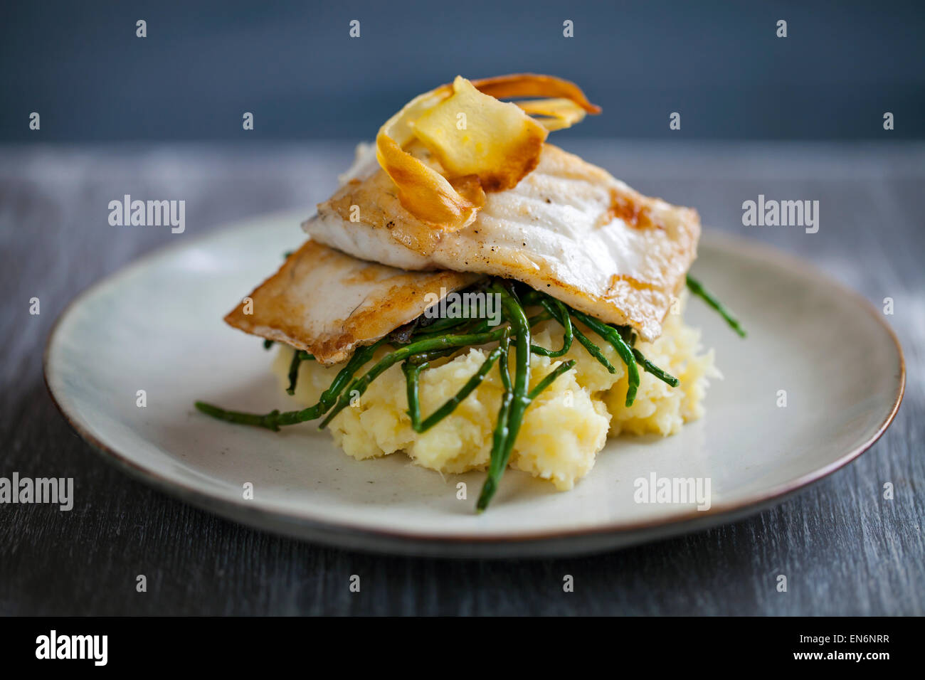 Sea bass fillet with parsnip and samphire Stock Photo Alamy