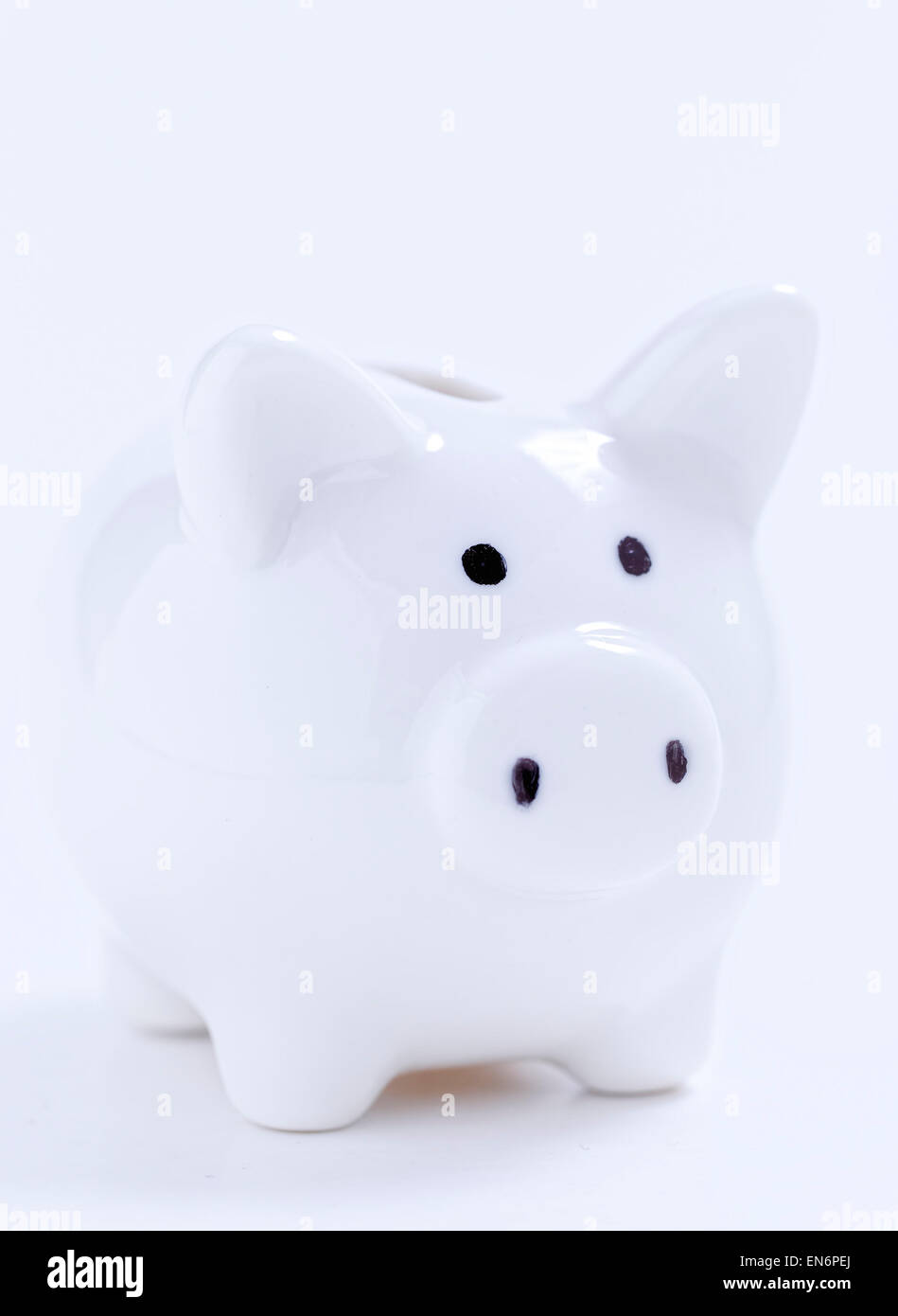 White piggy bank on white background Stock Photo - Alamy