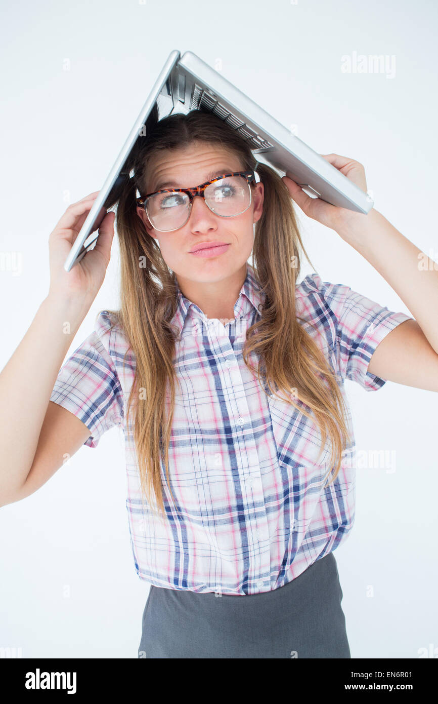 Geek Hunched Over Computer Geeky hipster holding her laptop over her head Stock Photo - Alamy