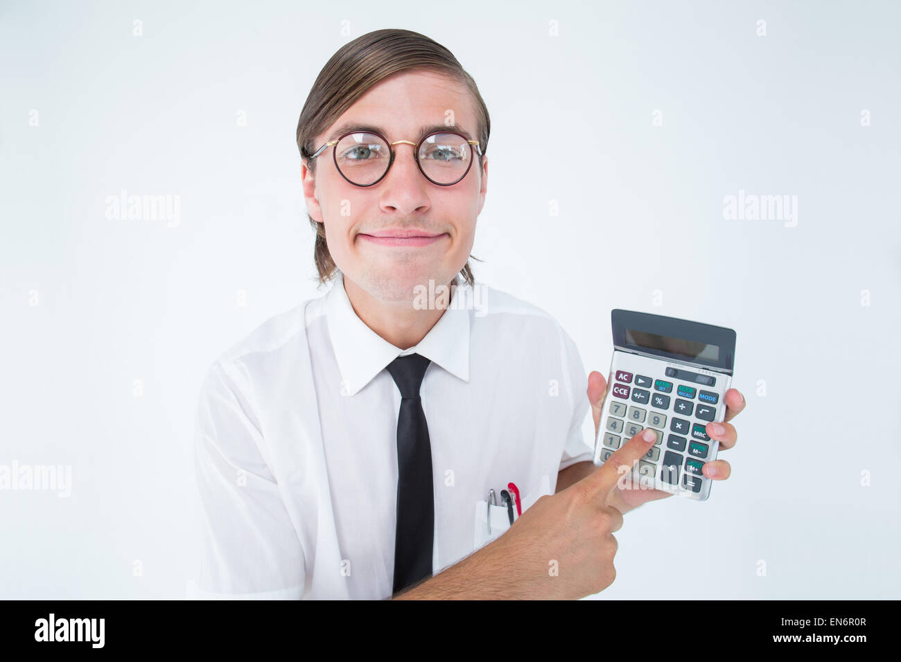 Geeky smiling businessman showing calculator Stock Photo - Alamy