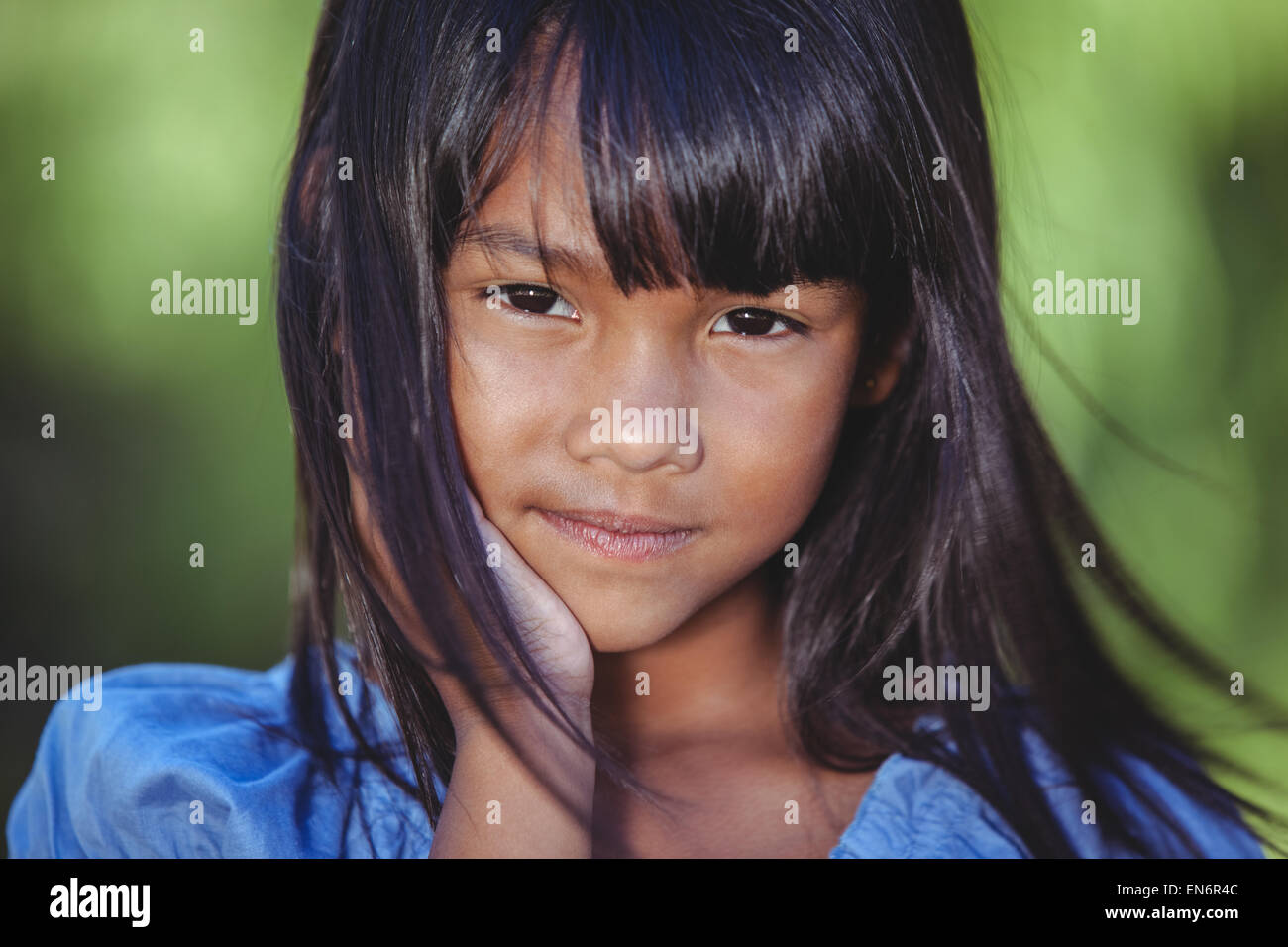 Cute little girl in the park Stock Photo - Alamy