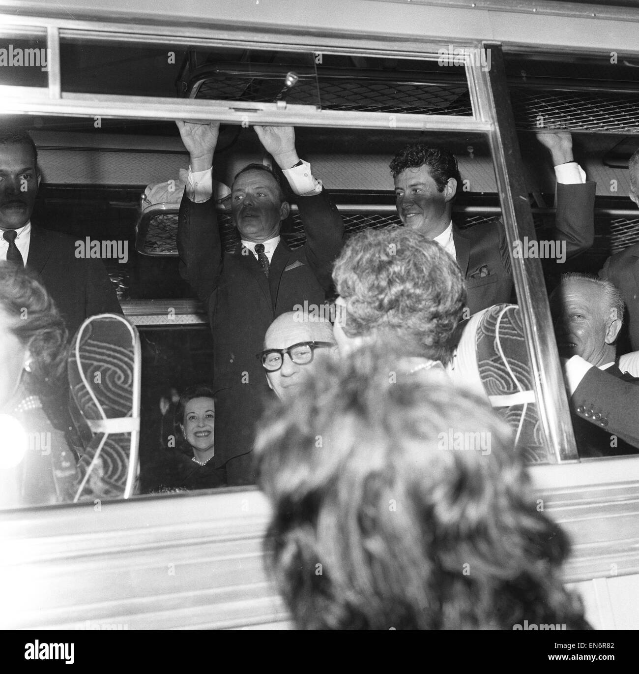 Frank Sinatra seen here on the coach at the premiere of the Cold War thriller The Manchurian Candidate. 15th June 1962 Stock Photo