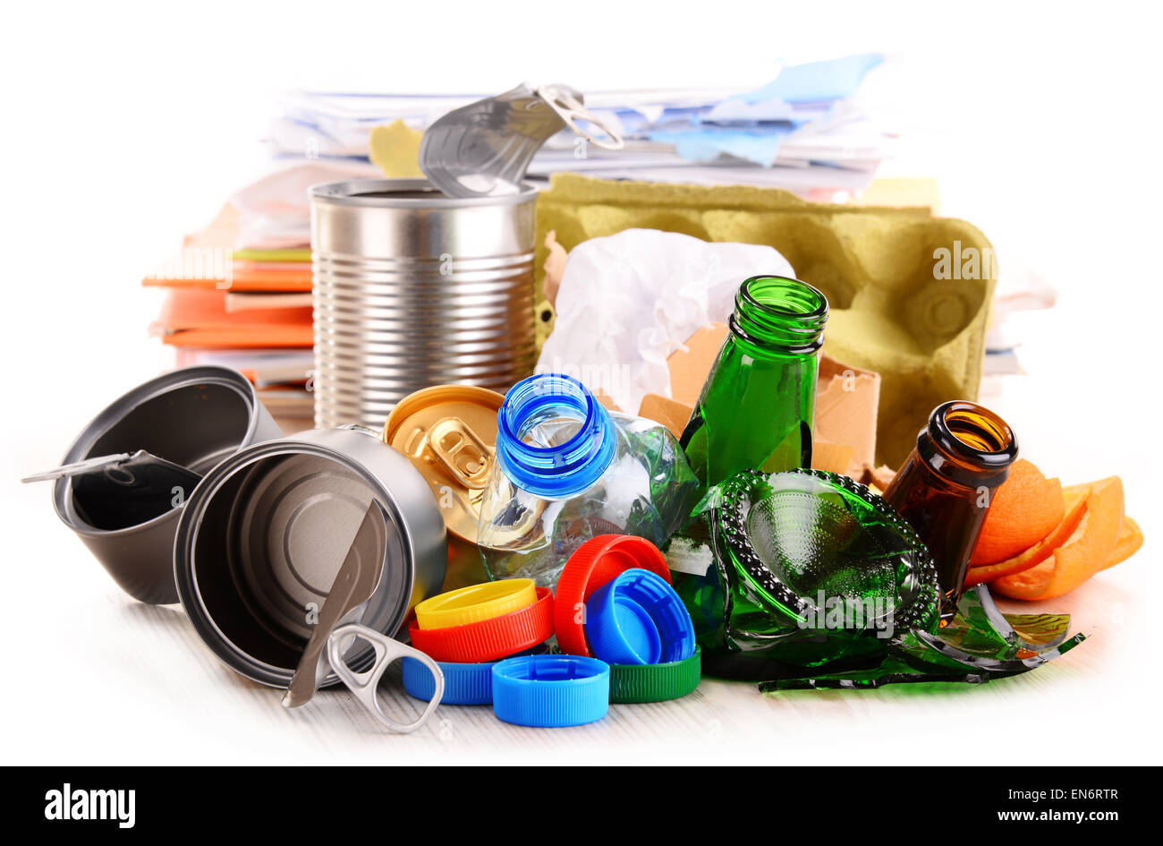 Recyclable garbage consisting of glass, plastic, metal and paper isolated on white background Stock Photo