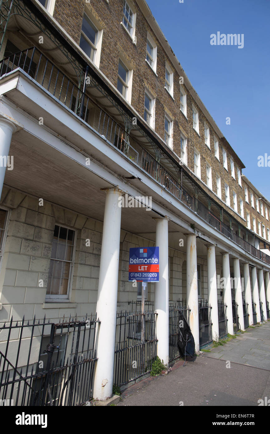 terraced houses on Wellington Crescent, abisected by The