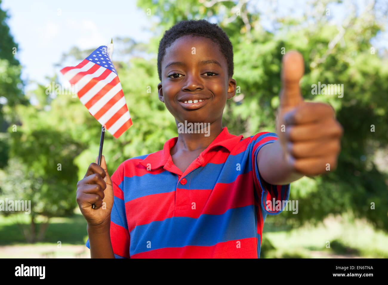 Little boy waving american flag Stock Photo