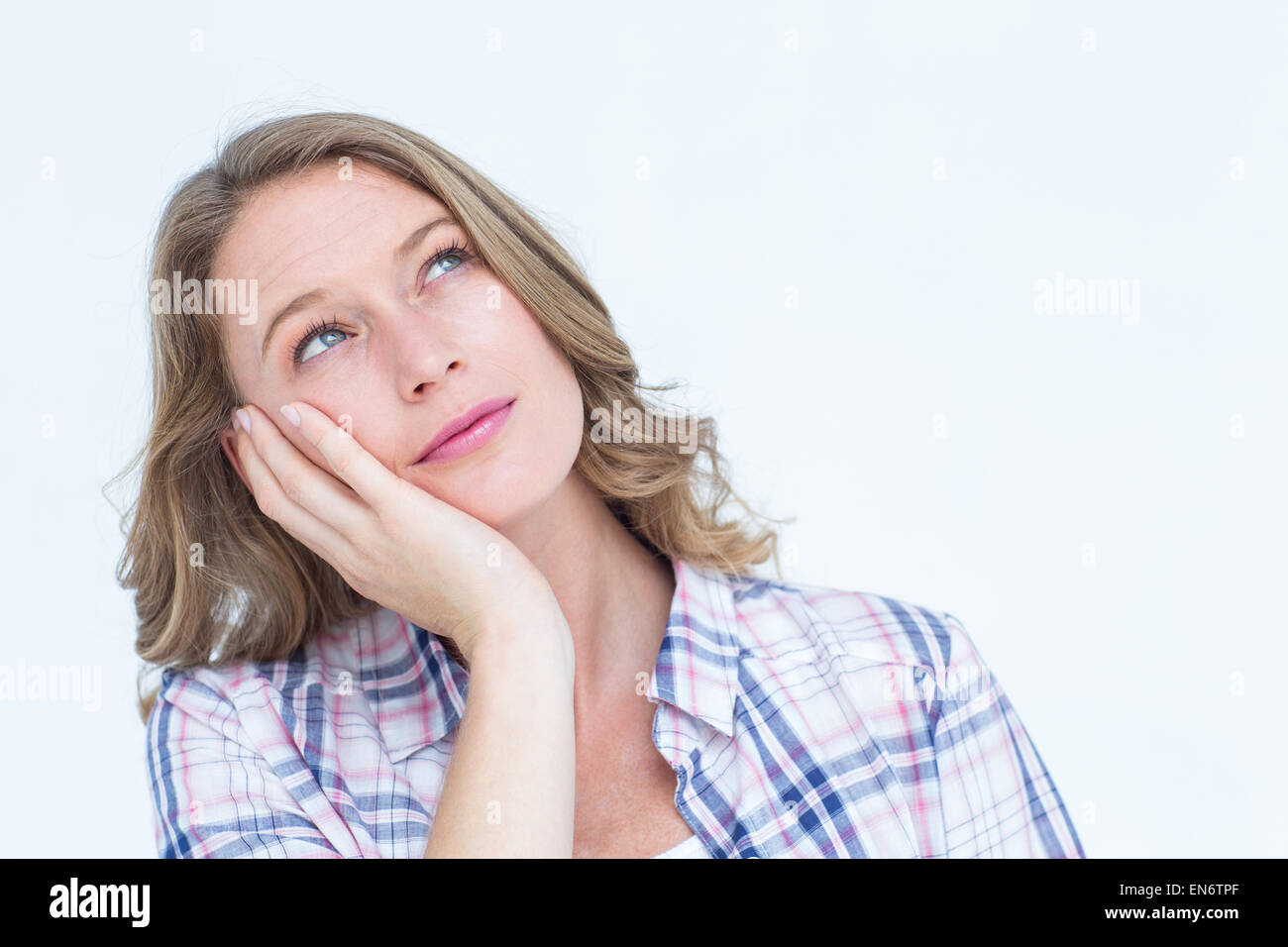 Pretty day dreaming hipster Stock Photo