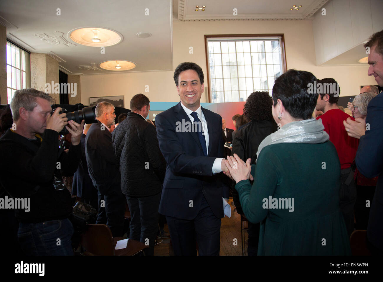 London, UK. Wednesday 29th April 2015. Labour Party Leader Ed Miliband leaving a General Election 2015 campaign event on the Tory threat to family finances, entitled: The Tories’ Secret Plan. Held at the Royal Institute of British Architects. Credit:  Michael Kemp/Alamy Live News Stock Photo