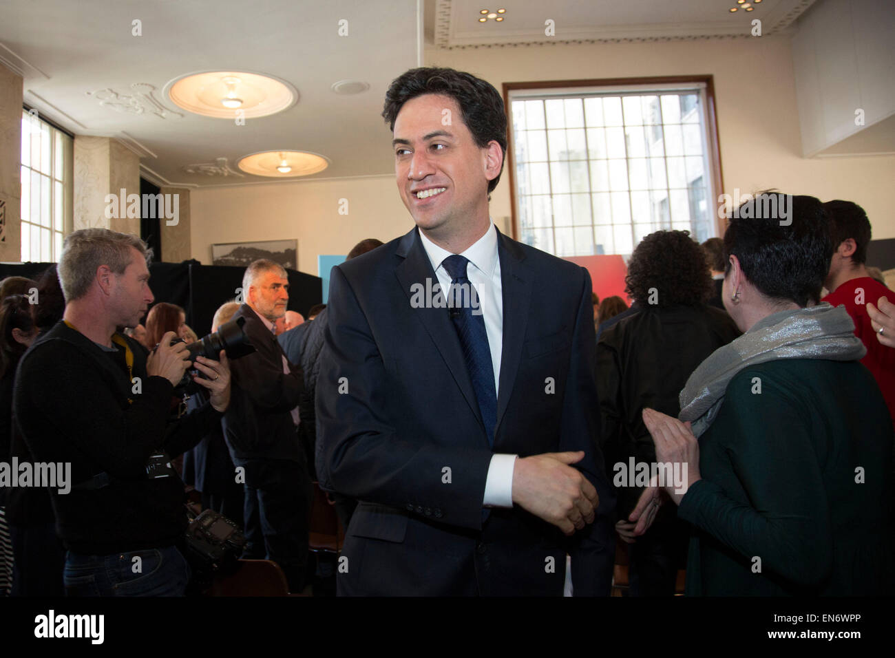 London, UK. Wednesday 29th April 2015. Labour Party Leader Ed Miliband leaving a General Election 2015 campaign event on the Tory threat to family finances, entitled: The Tories’ Secret Plan. Held at the Royal Institute of British Architects. Credit:  Michael Kemp/Alamy Live News Stock Photo