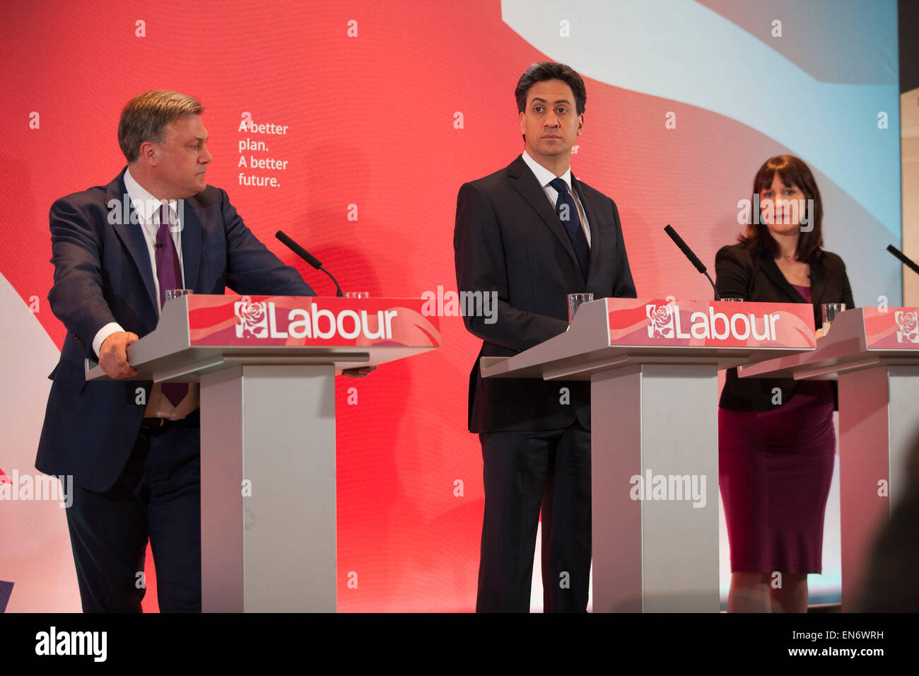 London, UK. Wednesday 29th April 2015. Labour Party Leader Ed Miliband, Shadow Chancellor Ed Balls, and Shadow Secretary of State for Work and Pensions Rachel Reeves at a General Election 2015 campaign event on the Tory threat to family finances, entitled: The Tories’ Secret Plan. Held at the Royal Institute of British Architects. Credit:  Michael Kemp/Alamy Live News Stock Photo