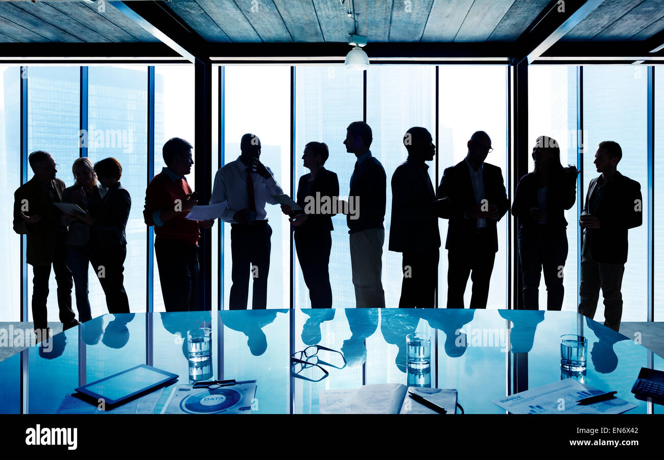 Silhouettes of business people in a conference room Stock Photo Alamy
