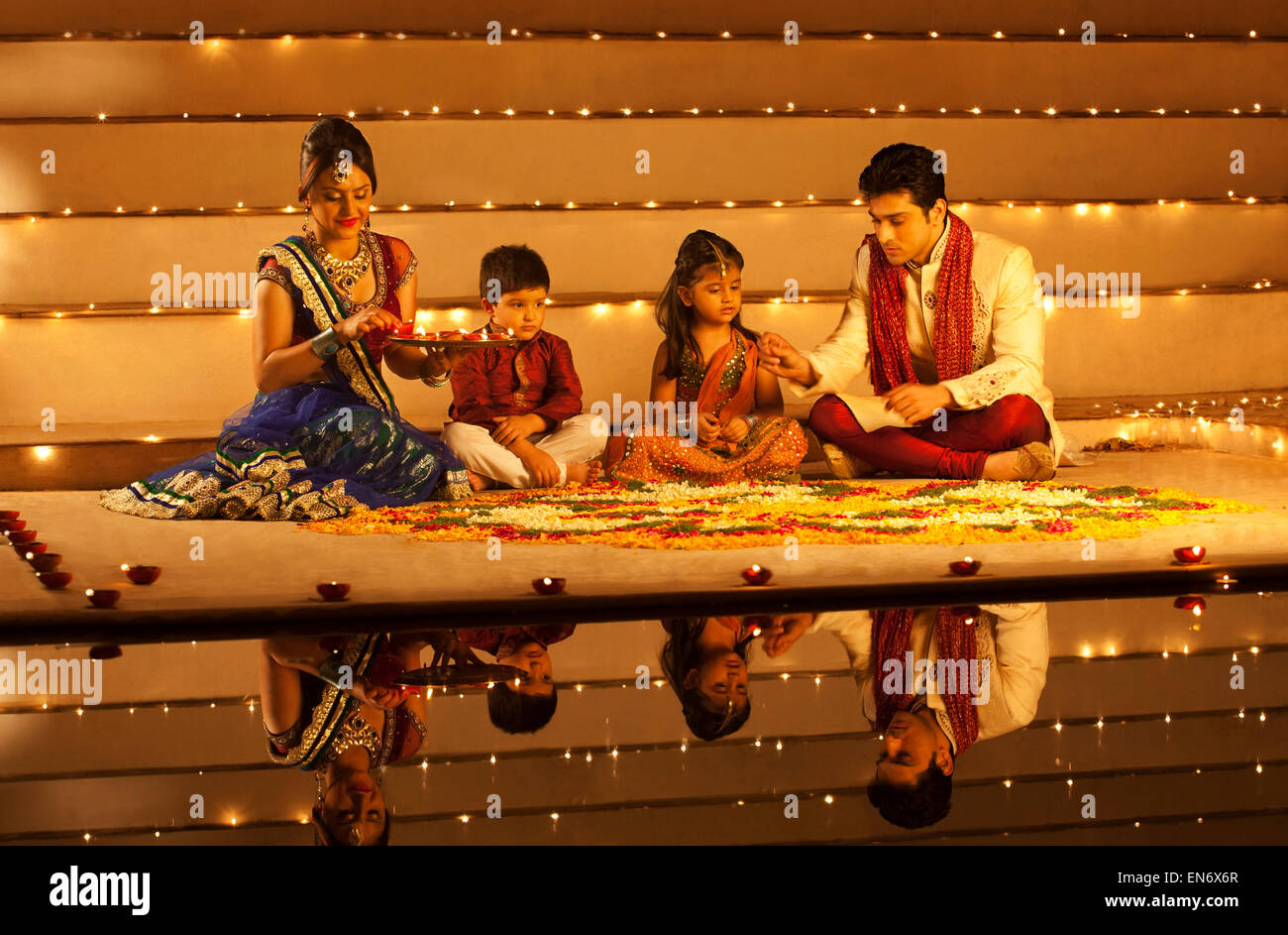 Rangoli family hi-res stock photography and images - Alamy