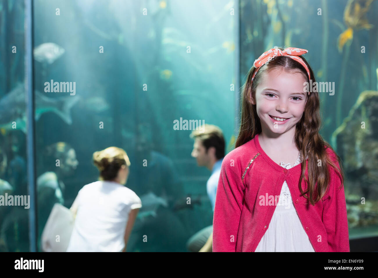 Little girl smiling at camera Stock Photo - Alamy
