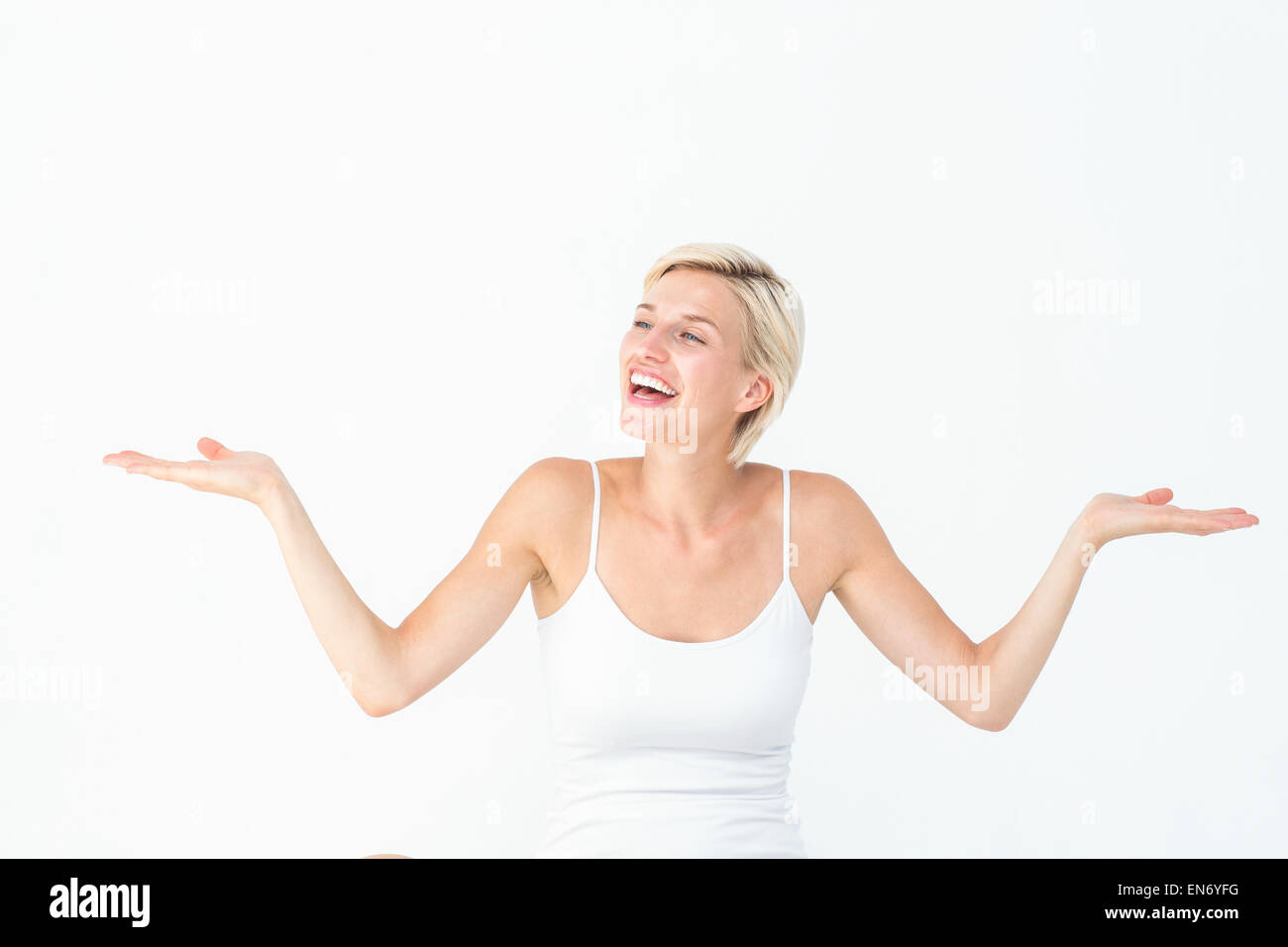 Happy blonde woman gesturing hi-res stock photography and images - Alamy