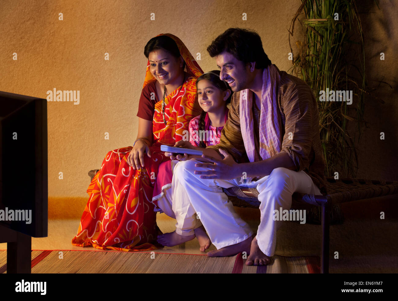 Rural family watching television Stock Photo Alamy
