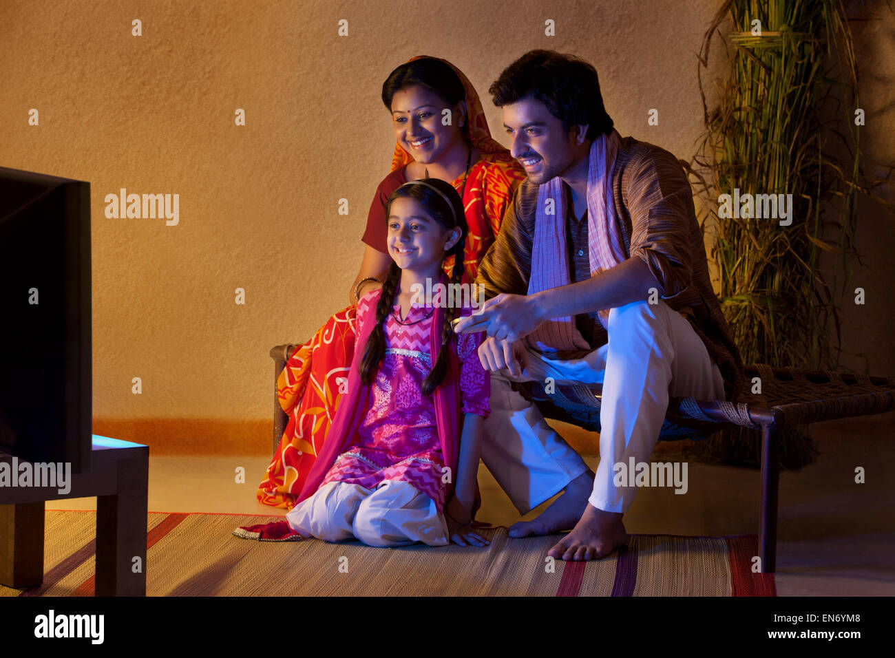 Rural family watching television Stock Photo Alamy