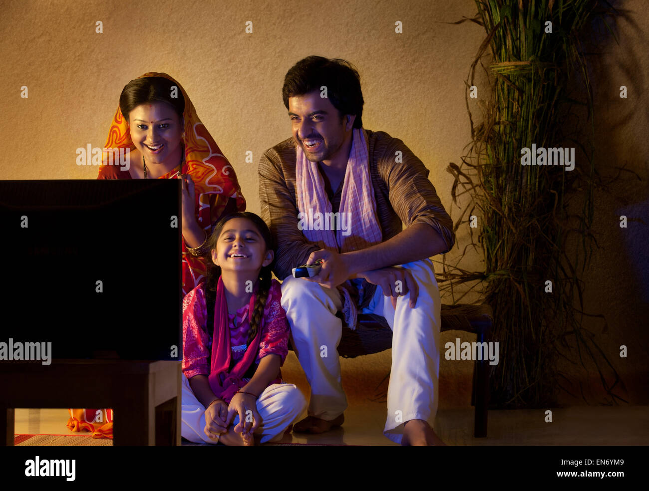 Rural family watching television Stock Photo Alamy