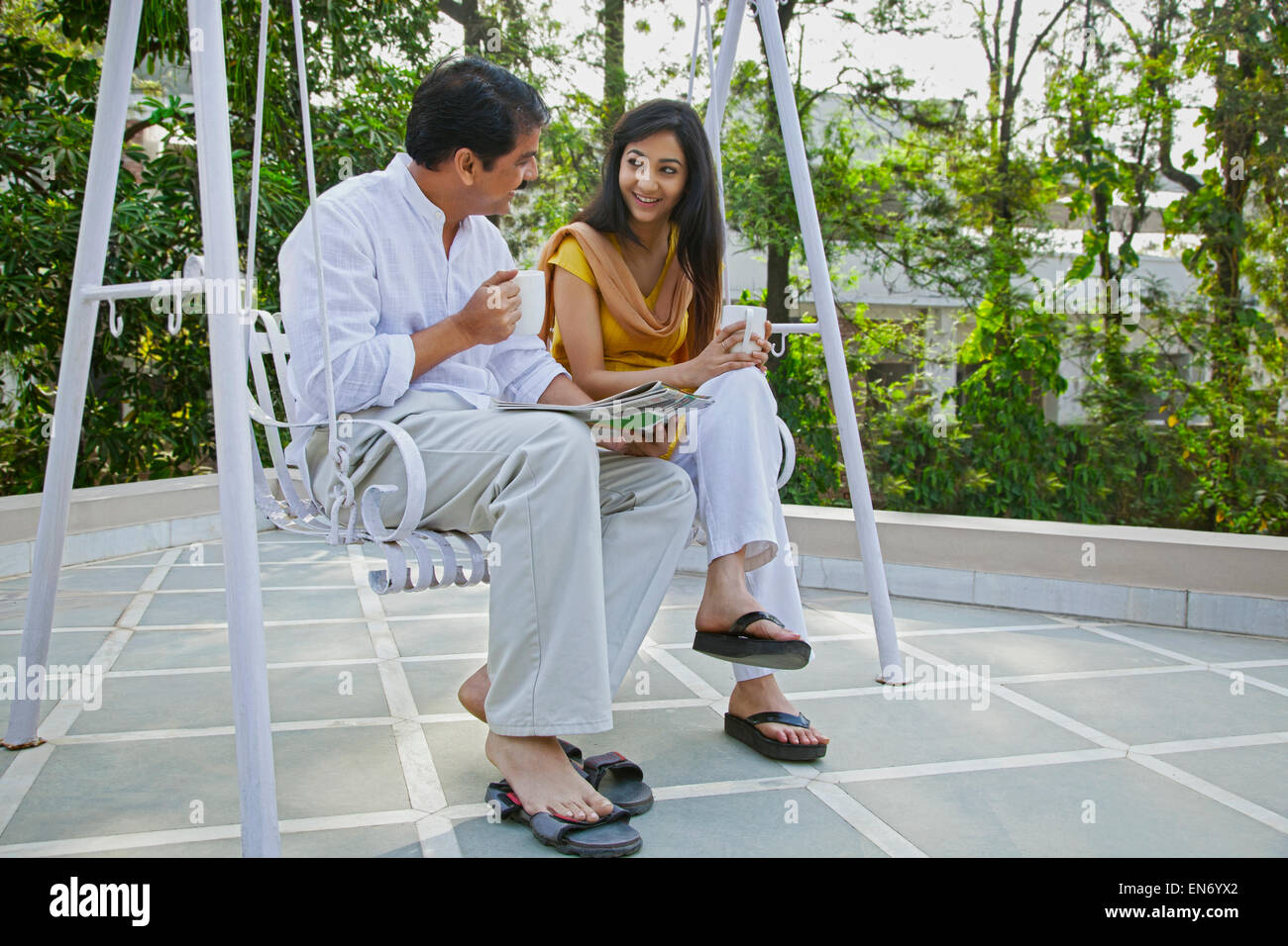 Man Sitting On Swing Stock Photos Man Sitting On Swing