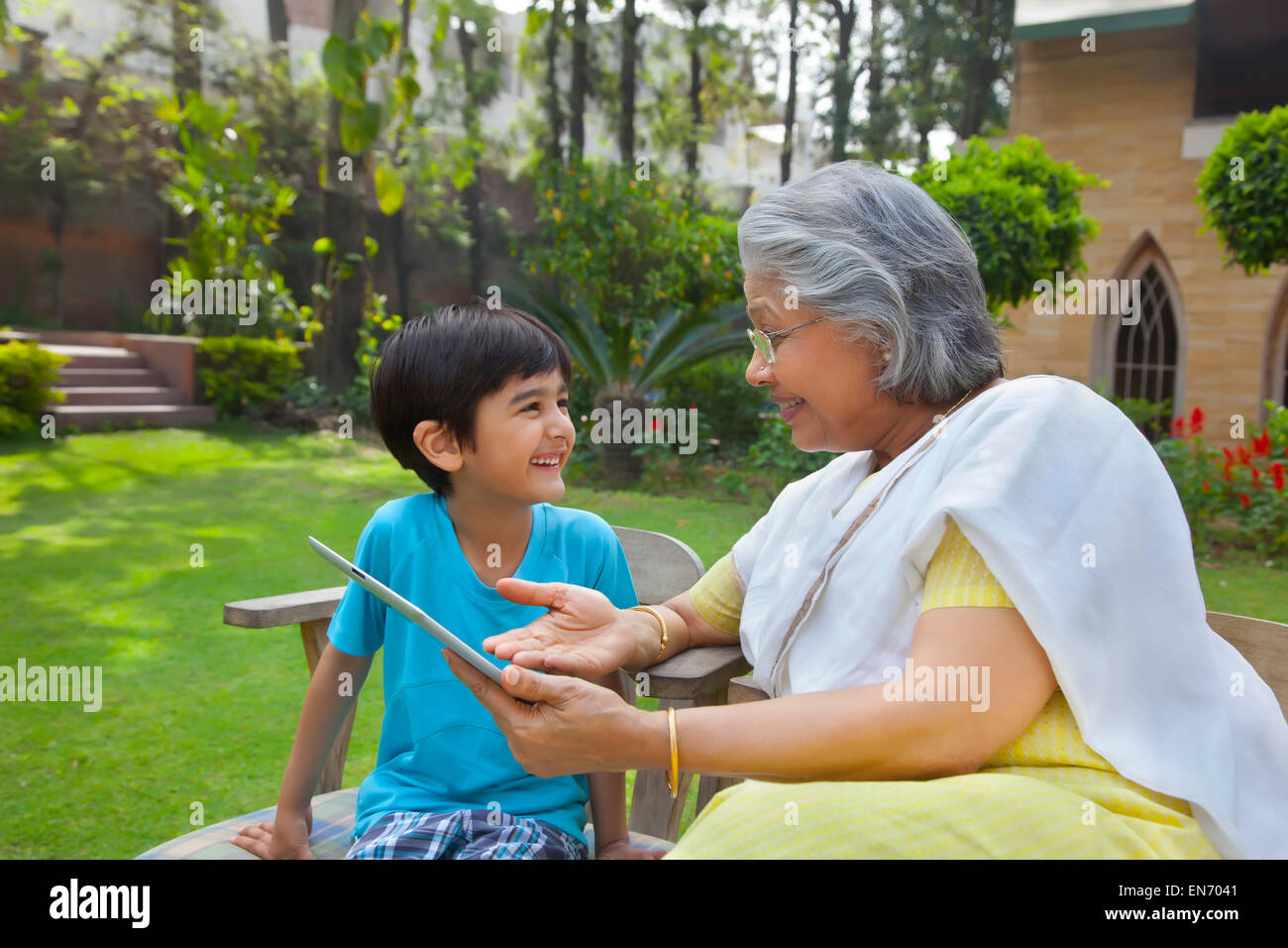 Grandmother child ipad hi-res stock photography and images - Alamy